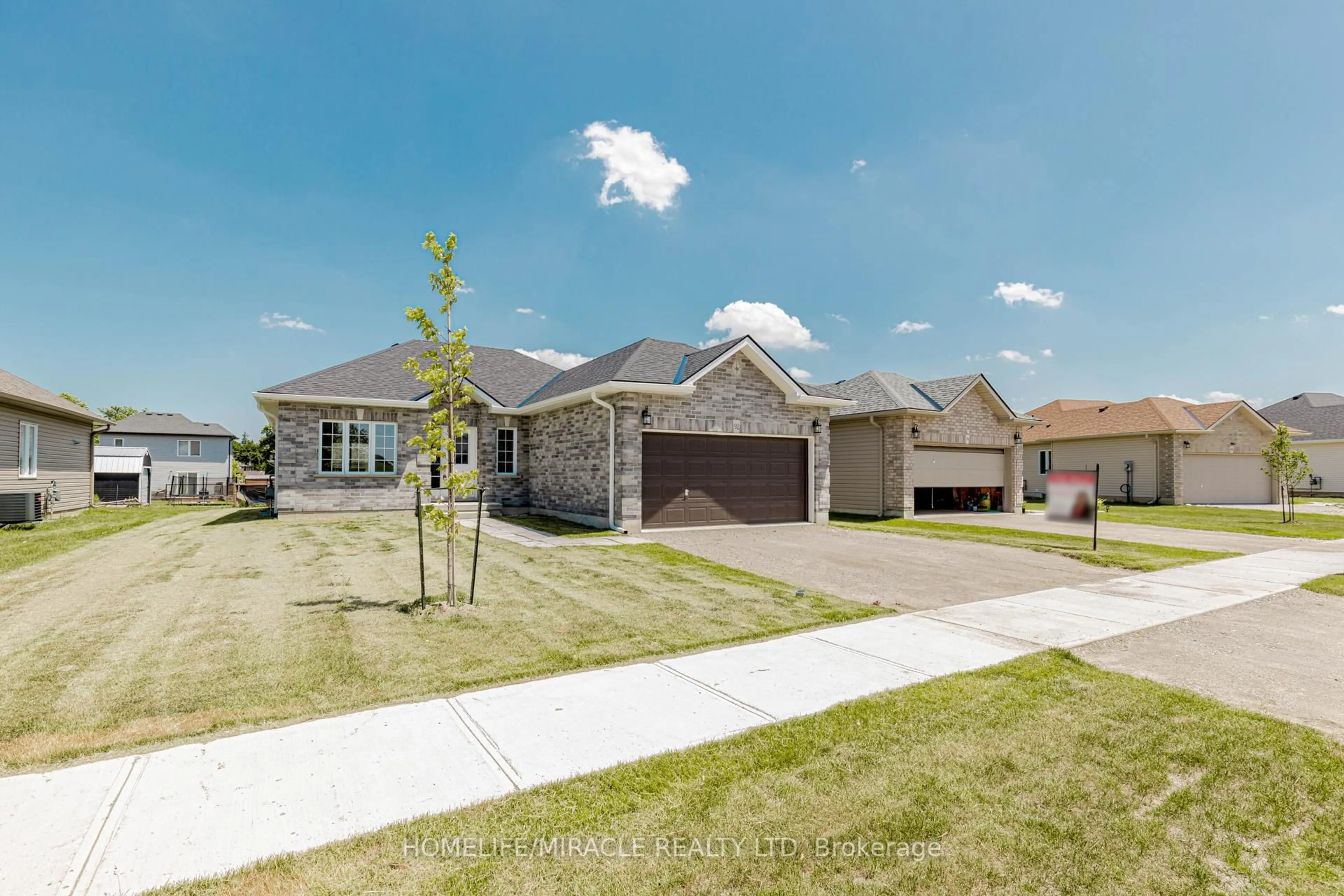 A pic from outside/outdoor area/front of a property/back of a property/a pic from drone, street for 92 Delong Dr, Norwich Ontario N0J 1P0