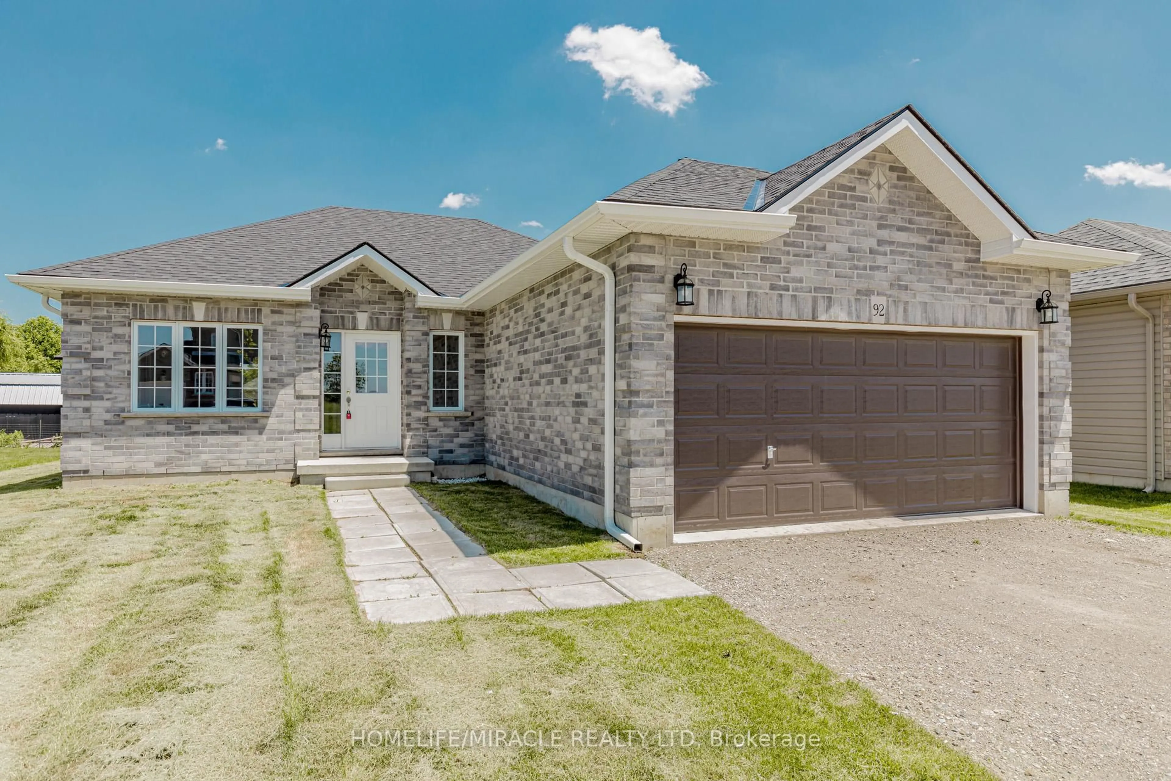 Home with brick exterior material, street for 92 Delong Dr, Norwich Ontario N0J 1P0