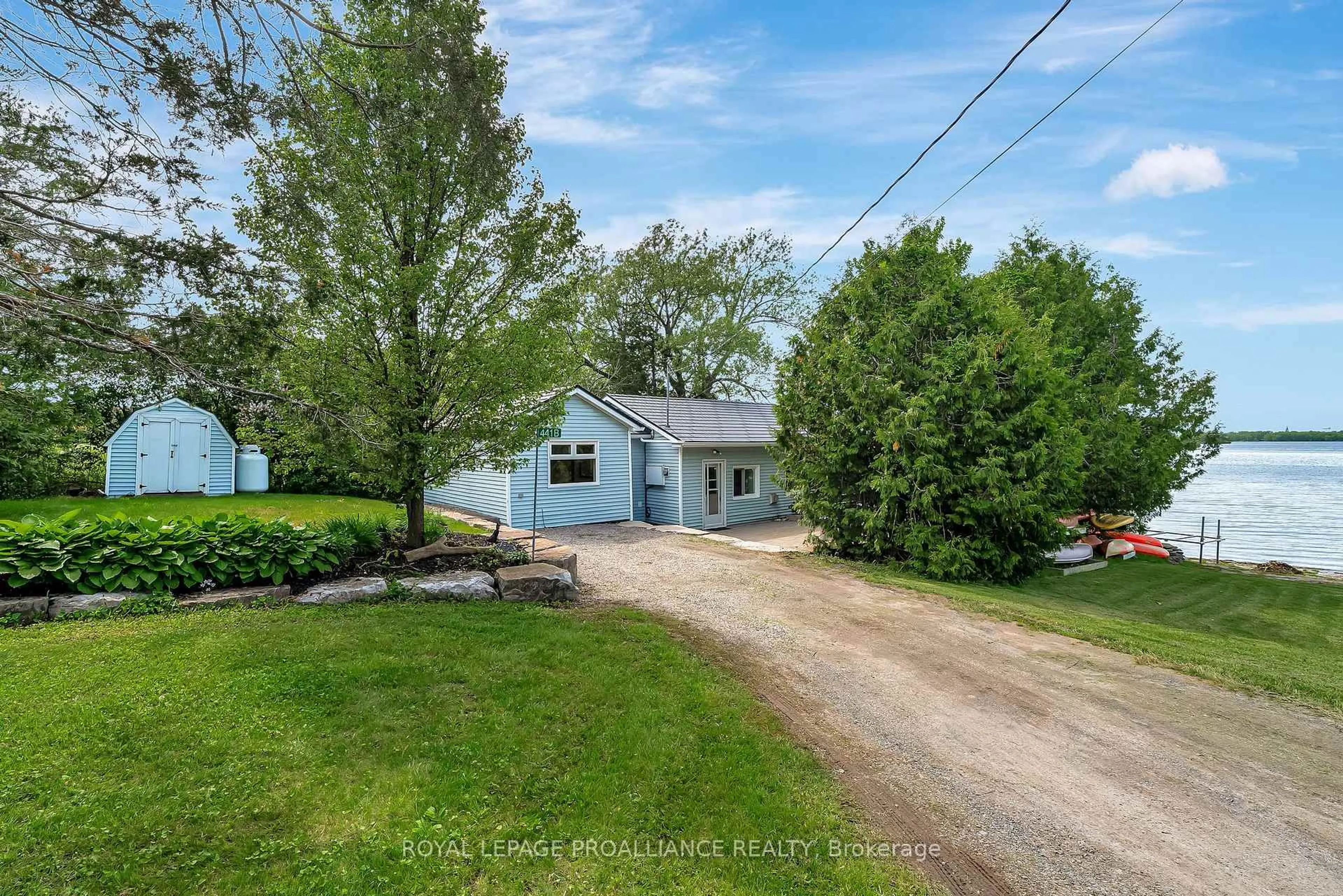 A pic from outside/outdoor area/front of a property/back of a property/a pic from drone, water/lake/river/ocean view for 441B Massassauga Rd, Prince Edward County Ontario K8N 4Z7