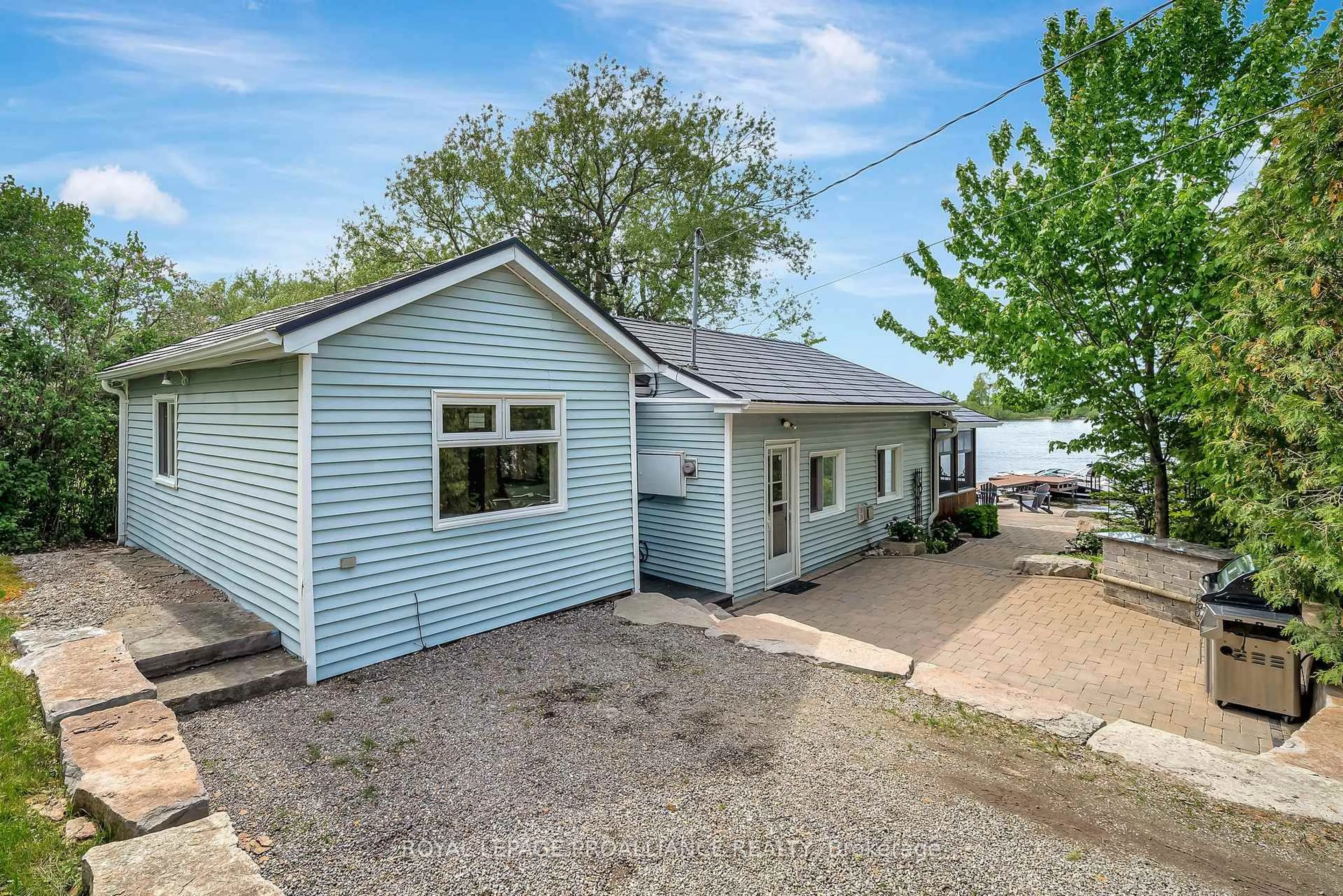 A pic from outside/outdoor area/front of a property/back of a property/a pic from drone, water/lake/river/ocean view for 441B Massassauga Rd, Prince Edward County Ontario K8N 4Z7