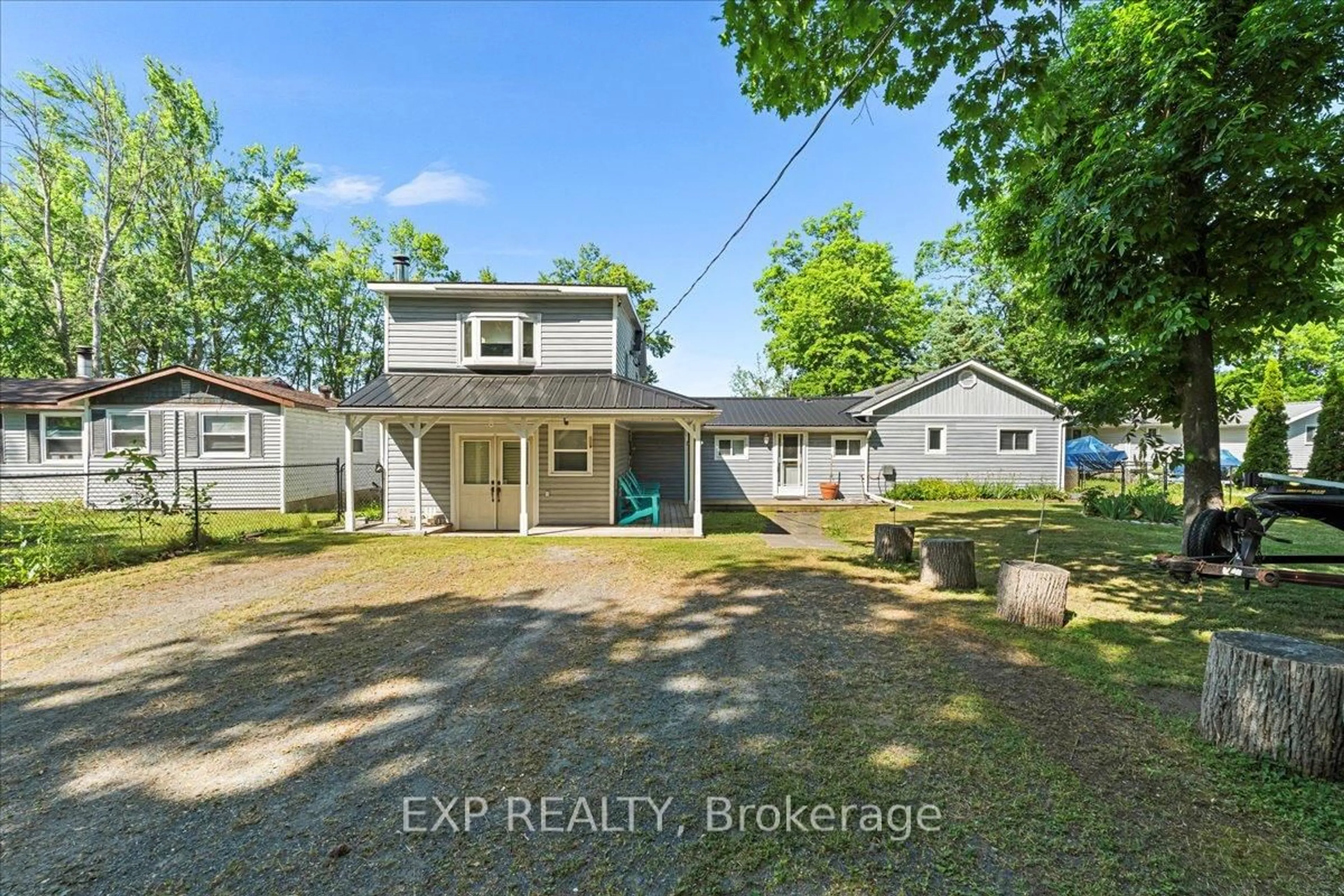 A pic from outside/outdoor area/front of a property/back of a property/a pic from drone, water/lake/river/ocean view for 233 River St, Trent Hills Ontario K0L 1L0