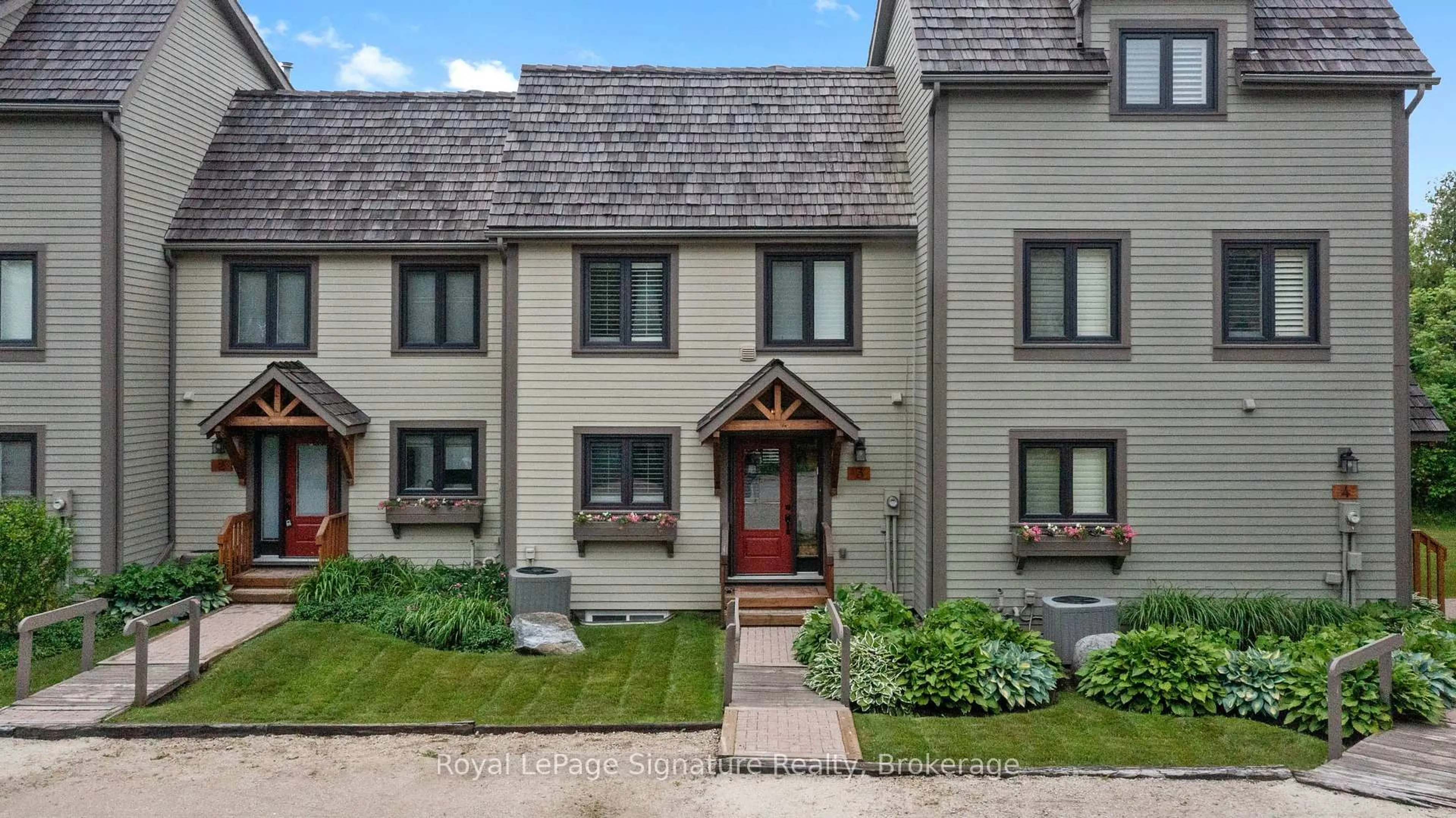 Home with brick exterior material, street for 63 BAY St #3, Blue Mountains Ontario N0H 2P0
