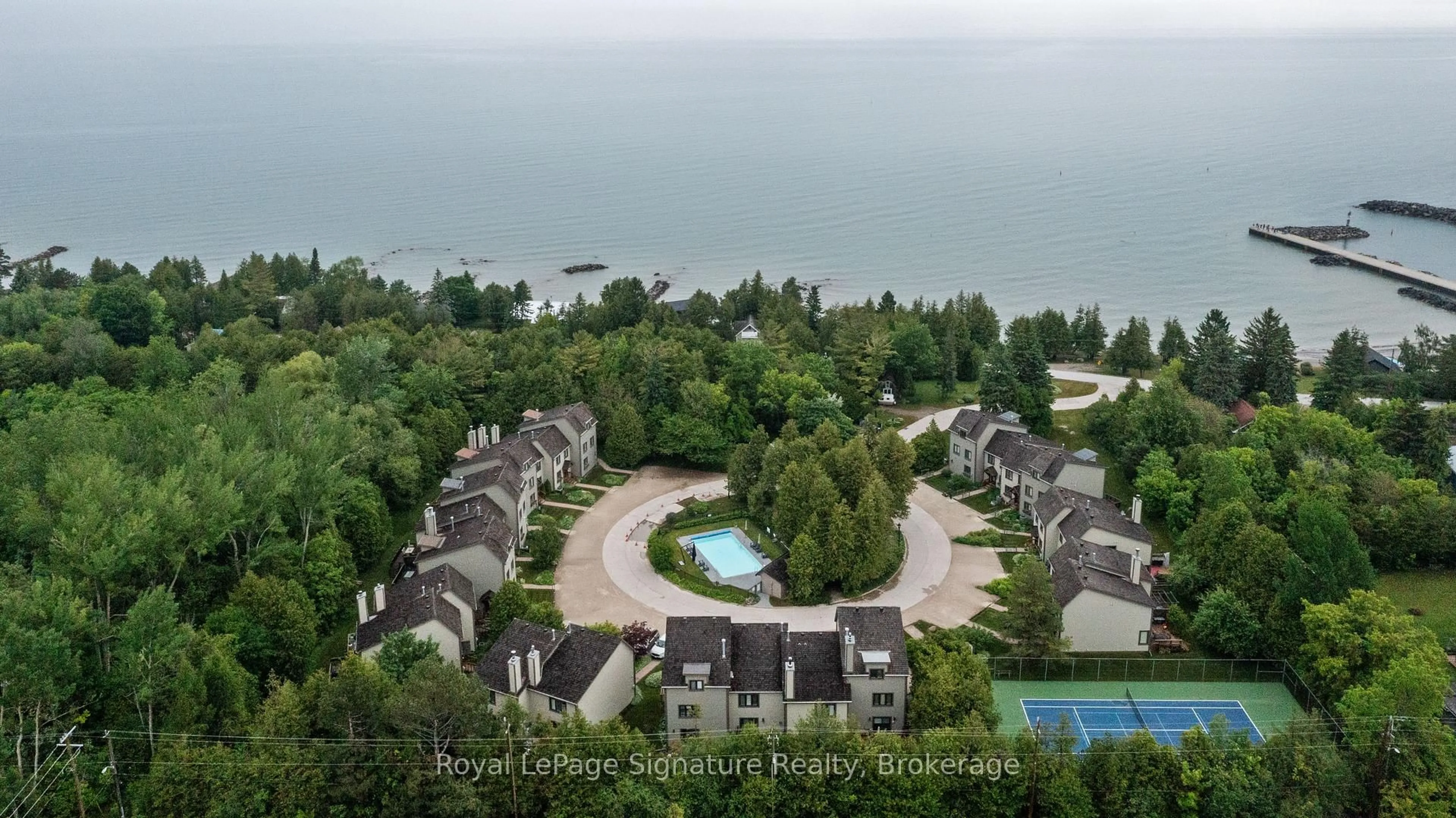 A pic from outside/outdoor area/front of a property/back of a property/a pic from drone, water/lake/river/ocean view for 63 BAY St #3, Blue Mountains Ontario N0H 2P0