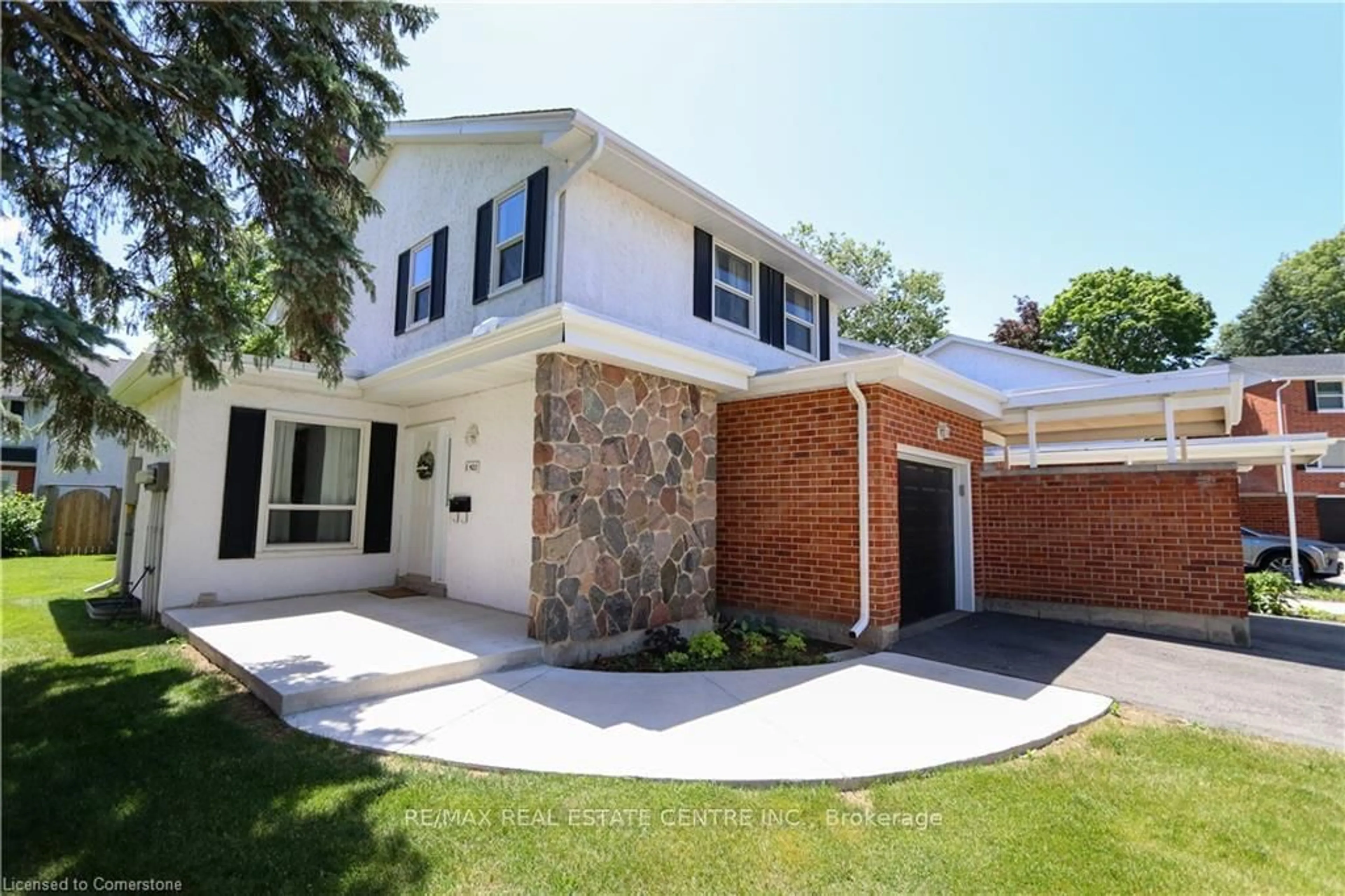Home with brick exterior material, street for 423 Keats Way #1, Waterloo Ontario N2L 5S7