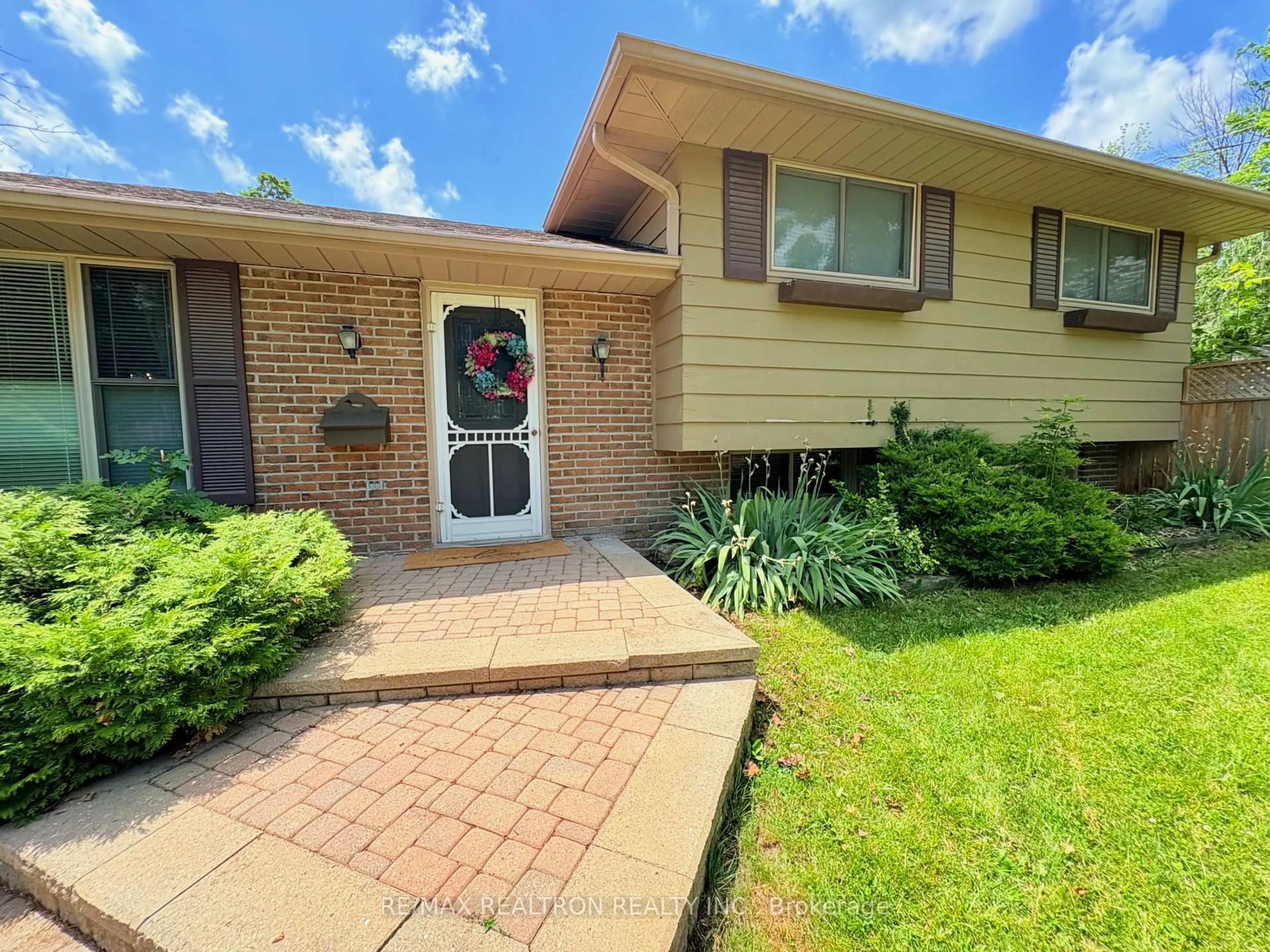 Home with brick exterior material, street for 323 Lindan Ave, Selwyn Ontario K9L 1K9