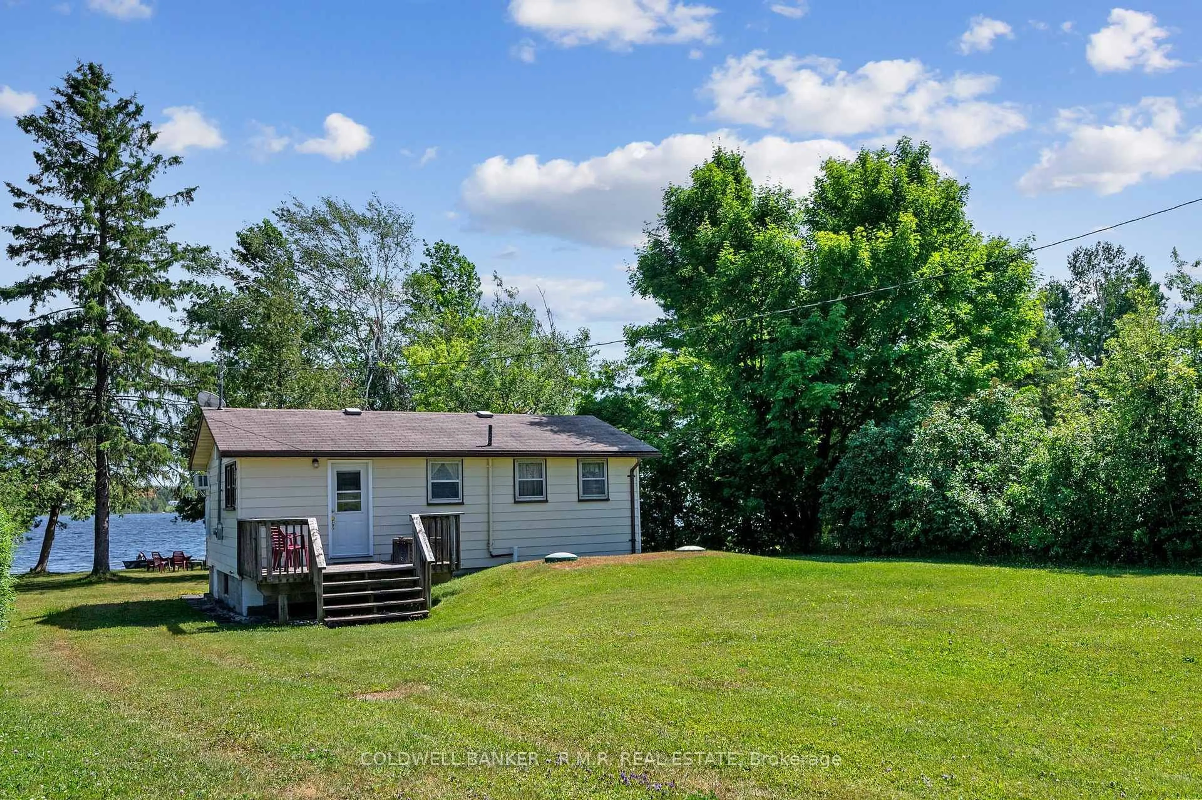 A pic from outside/outdoor area/front of a property/back of a property/a pic from drone, water/lake/river/ocean view for 253 McGuire Beach Rd, Kawartha Lakes Ontario K0M 2B0