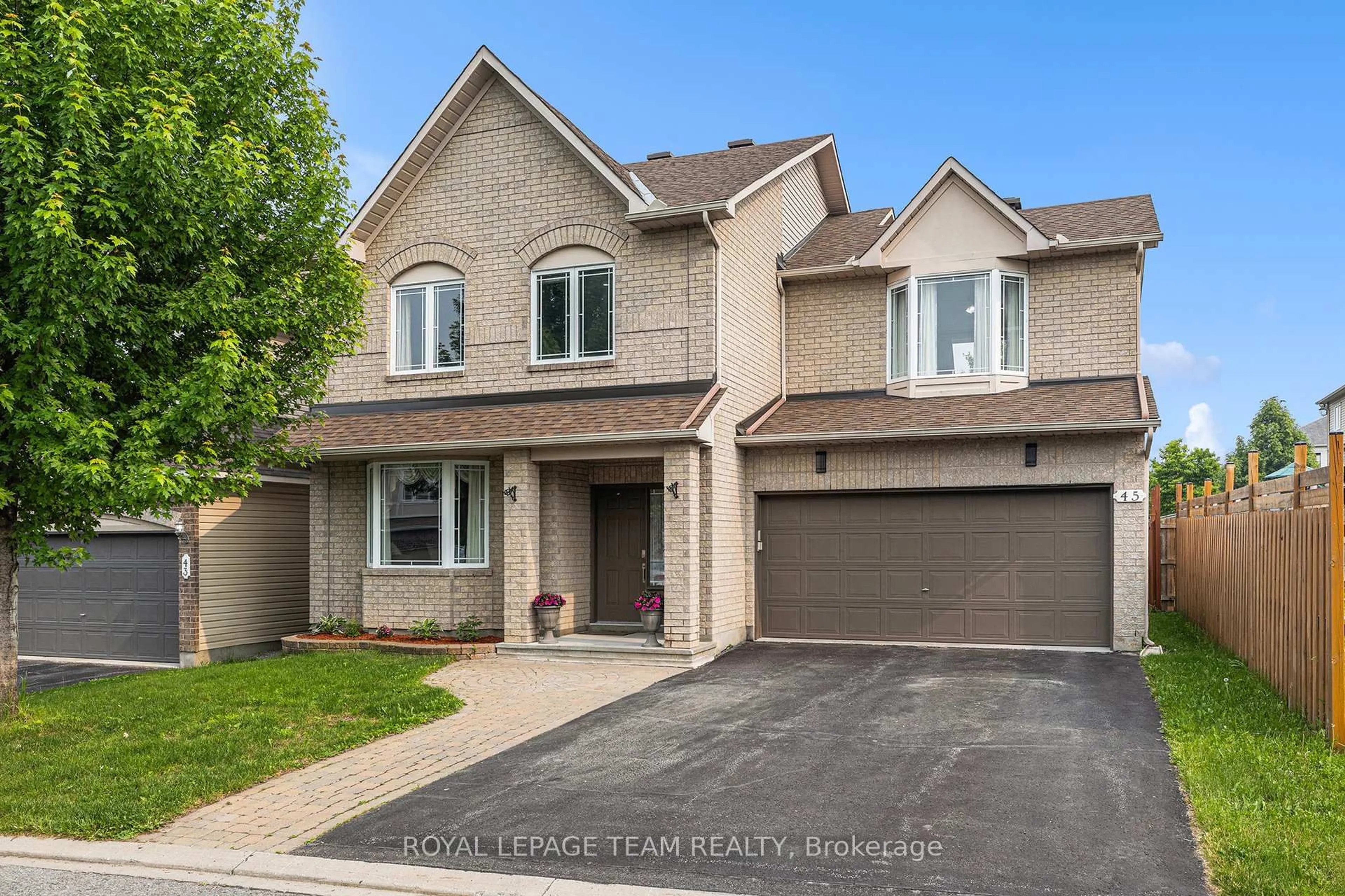 Home with brick exterior material, street for 45 Aquapass Pl, Ottawa Ontario K2G 6Z7