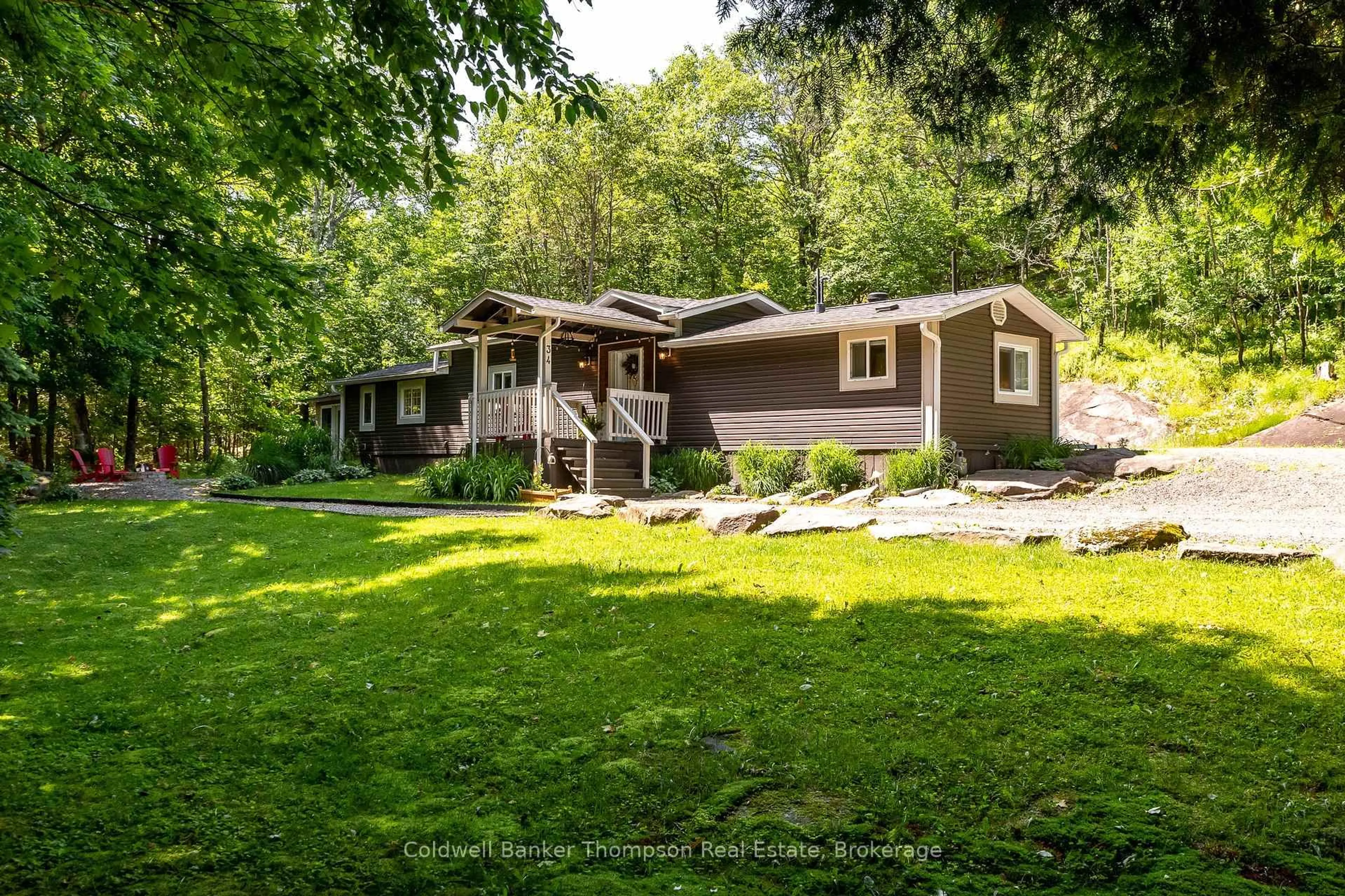 A pic from outside/outdoor area/front of a property/back of a property/a pic from drone, water/lake/river/ocean view for 34 Mount Vernon Tr, Huntsville Ontario P1H 1E6