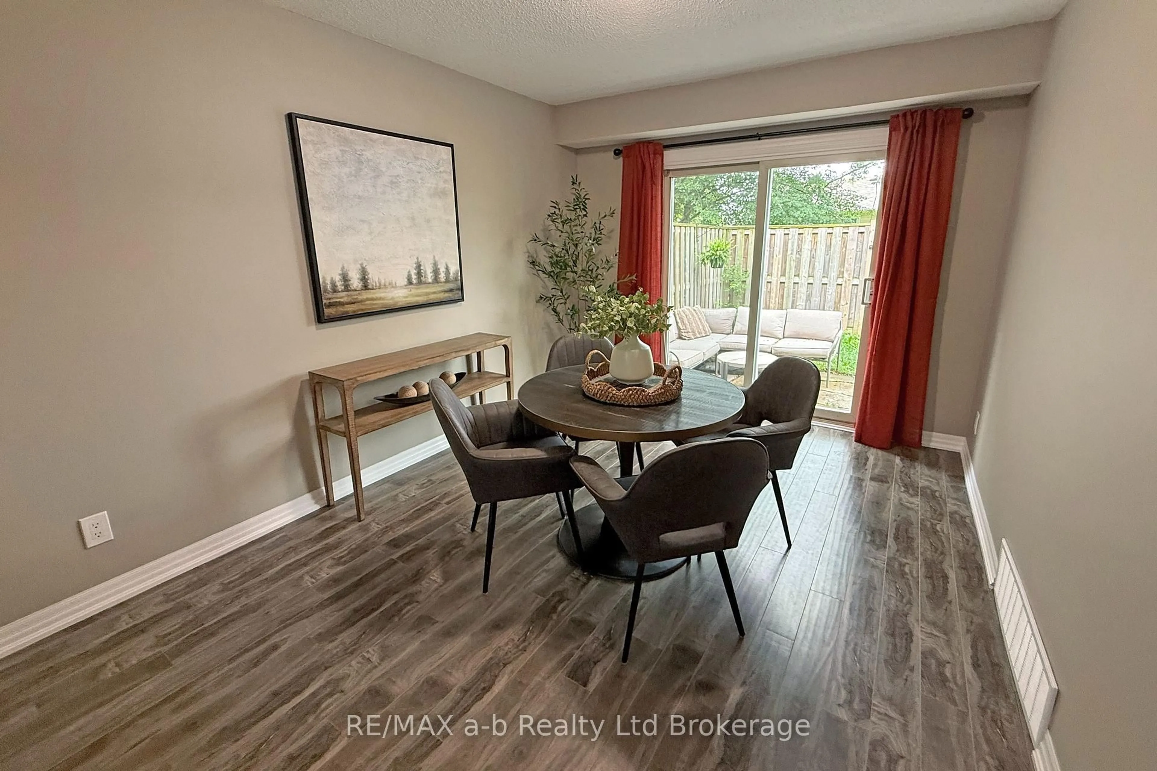 Dining room, wood/laminate floor for 279 Bluevale St #79, Waterloo Ontario N2J 4L8