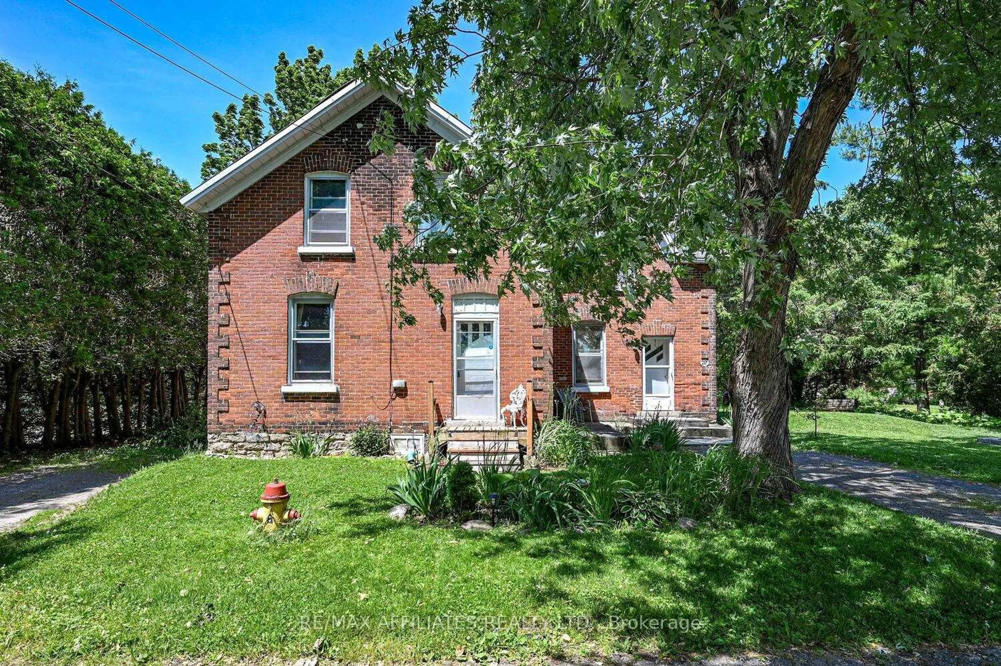 Home with brick exterior material, street for 217 William St, Merrickville-Wolford Ontario K0G 1N0