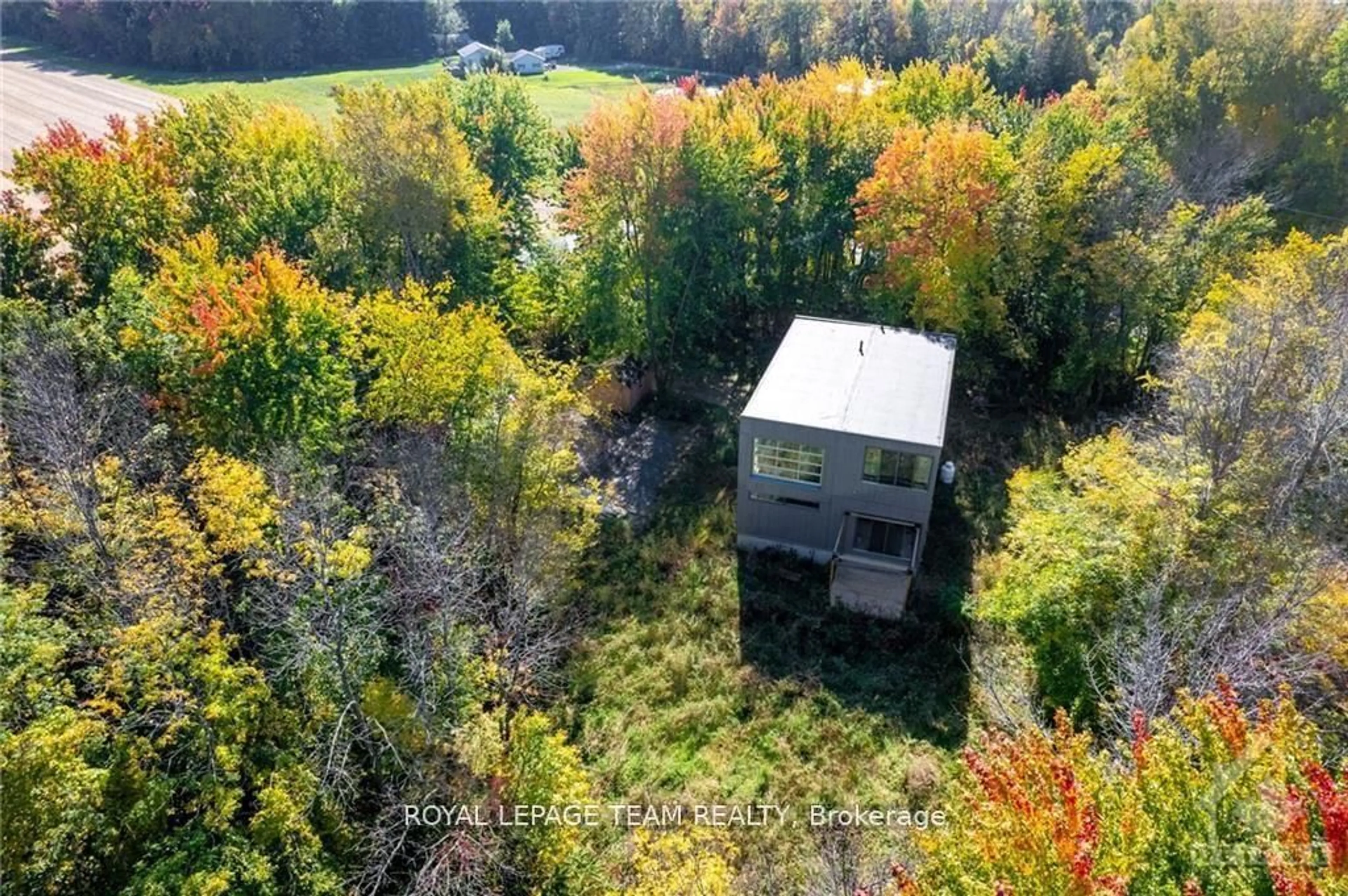 A pic from outside/outdoor area/front of a property/back of a property/a pic from drone, forest/trees view for 4397 Billy Lane, South Dundas Ontario K0C 2H0