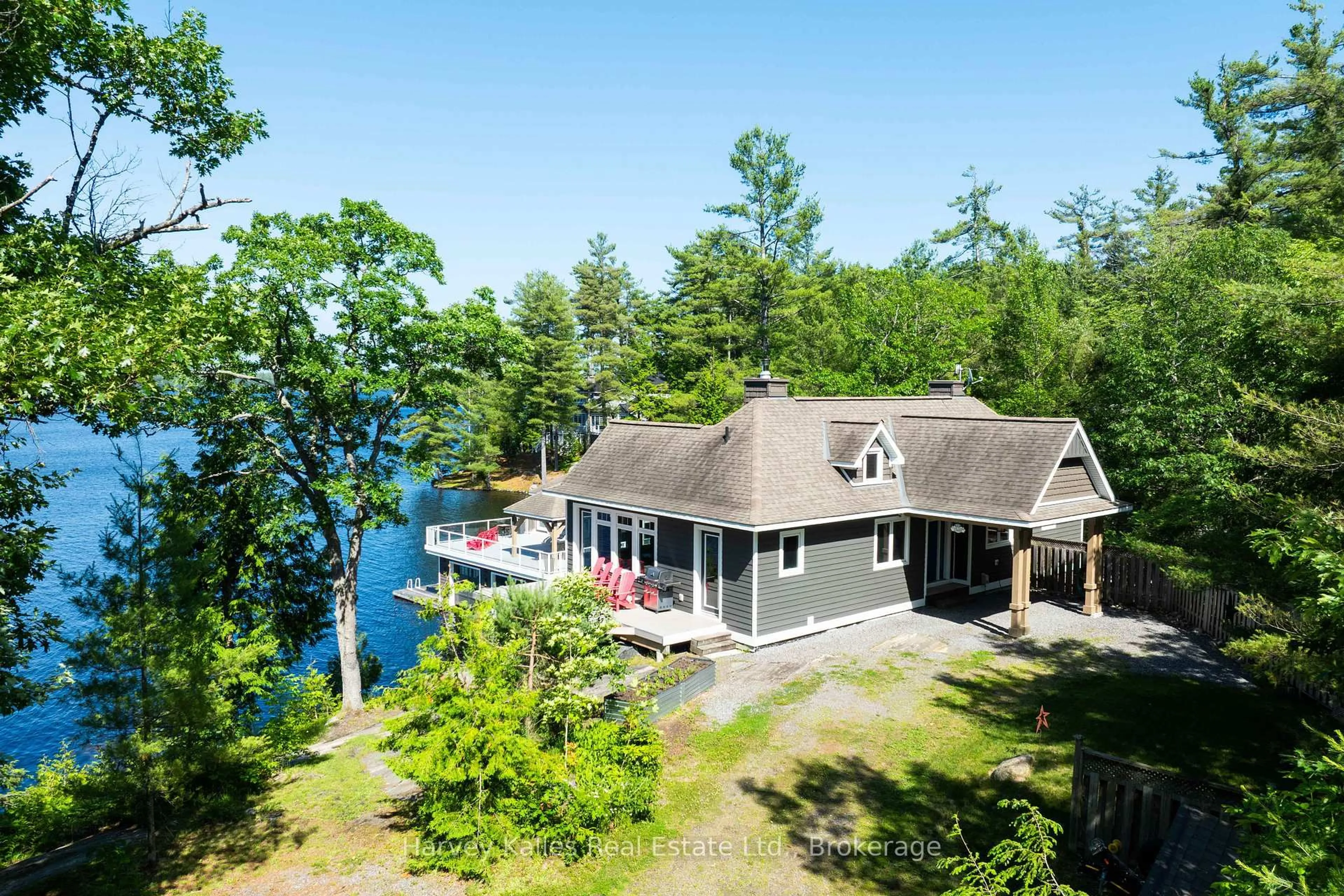 A pic from outside/outdoor area/front of a property/back of a property/a pic from drone, water/lake/river/ocean view for 2948 Muskoka Rd 169, Muskoka Lakes Ontario P0C 1A0