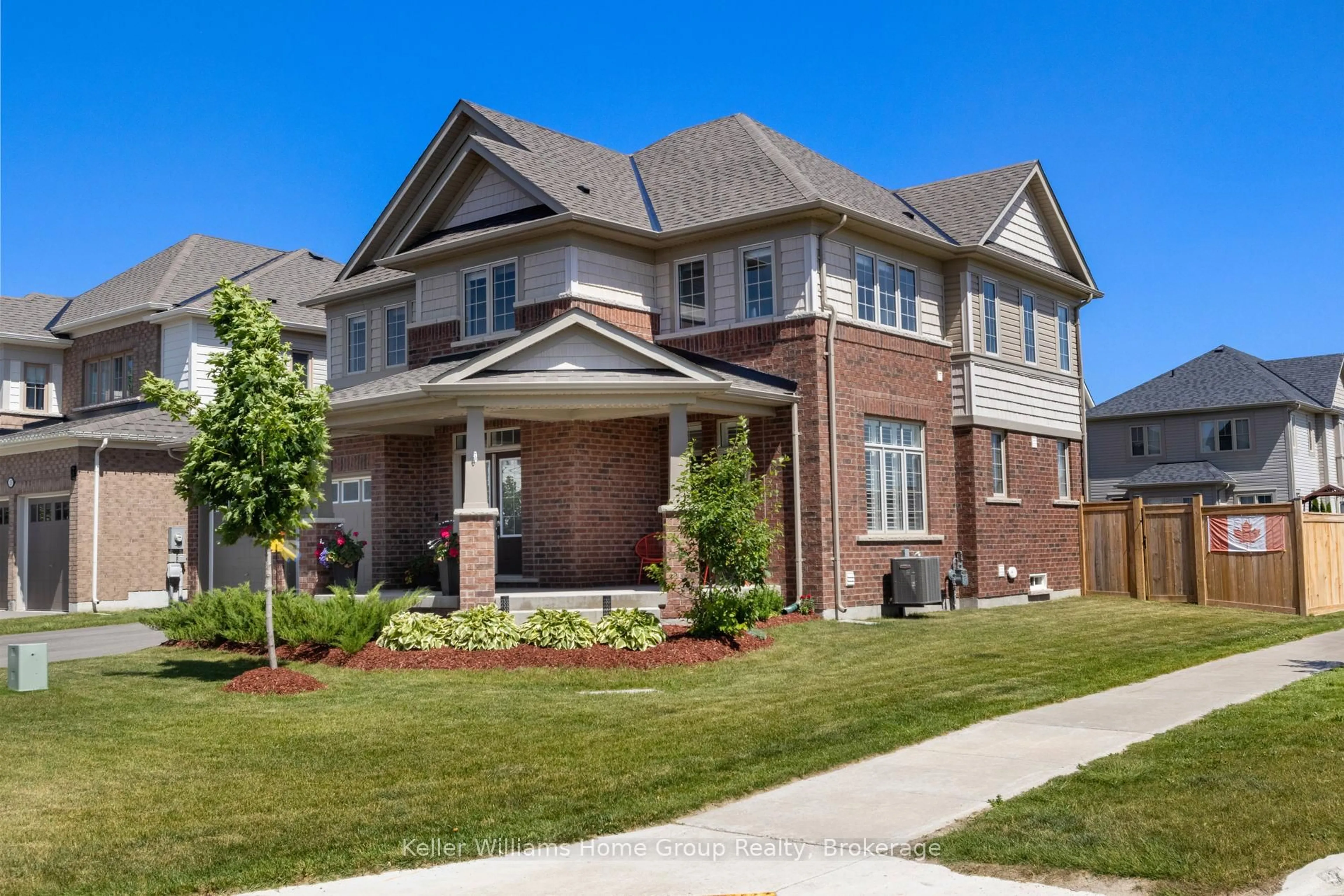 Home with brick exterior material, street for 11 Harpin Way, Centre Wellington Ontario N1M 0H2