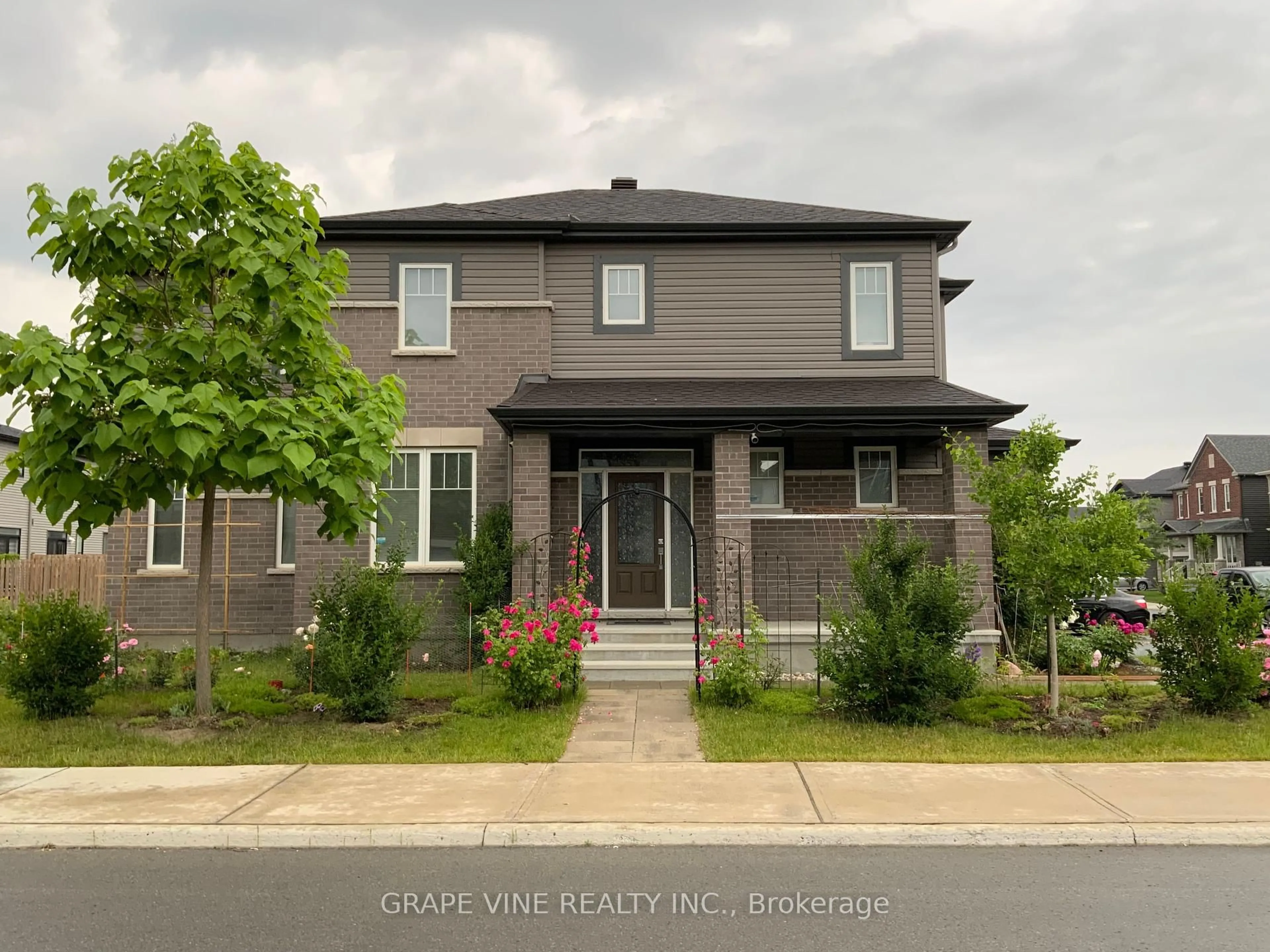 Home with vinyl exterior material, street for 22 Dalkey Way, Ottawa Ontario K2J 6V5