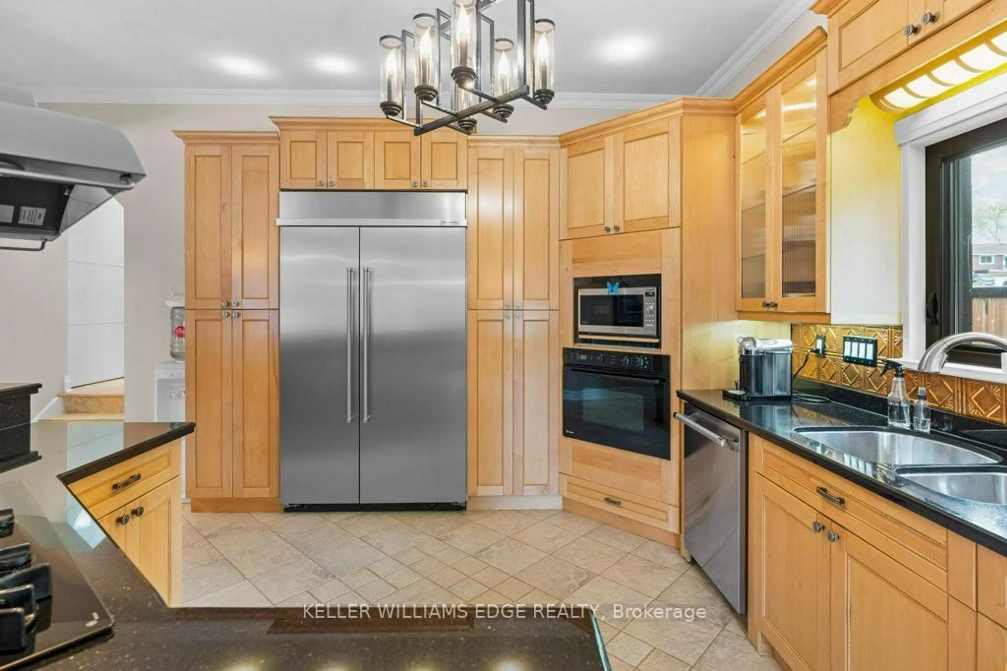 Open concept kitchen, ceramic/tile floor for 61 Lake Ave, Hamilton Ontario L8E 1L2