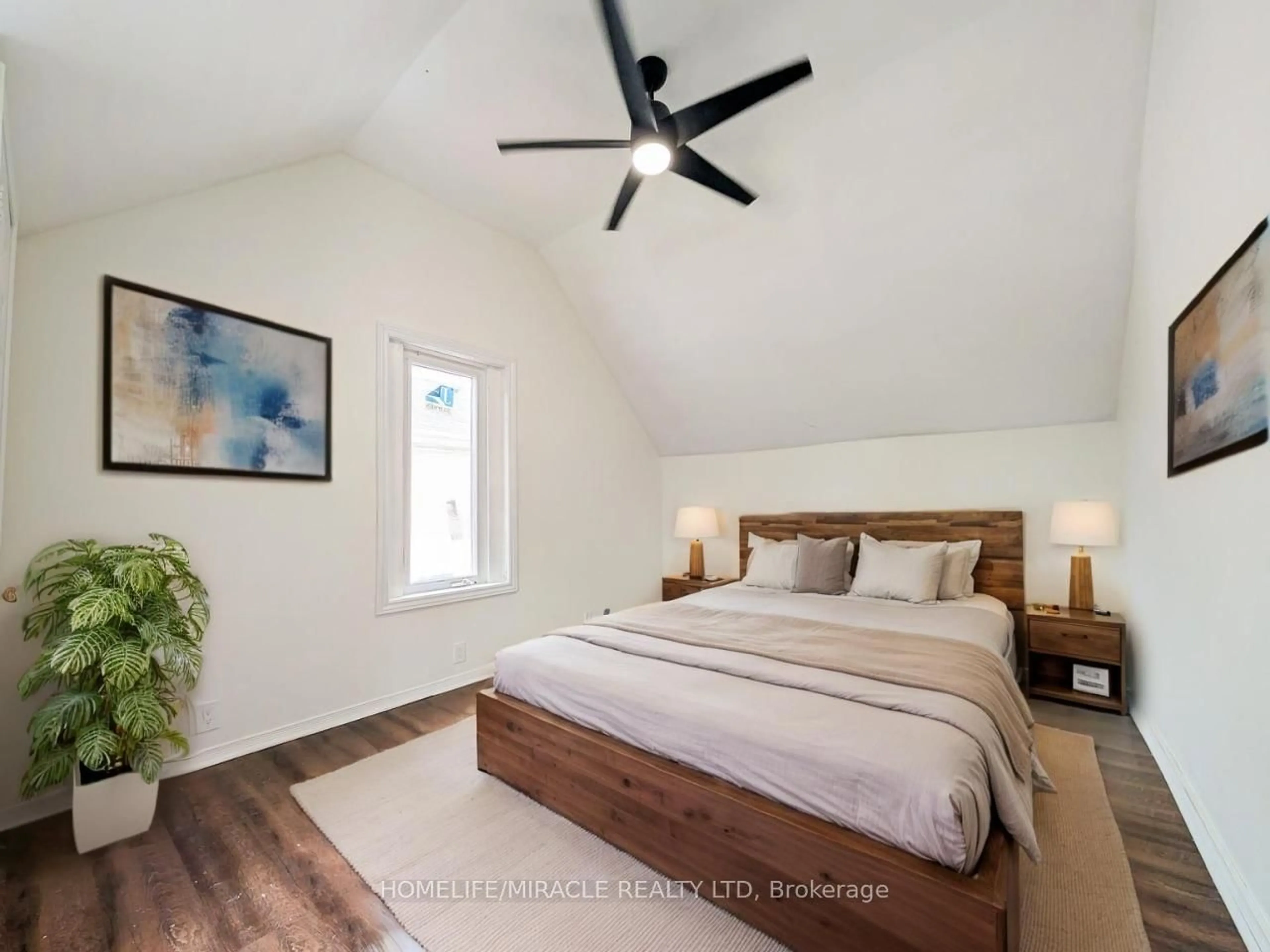 Bedroom with bed, wood/laminate floor for 24 Albion St, Belleville Ontario K8N 3R8