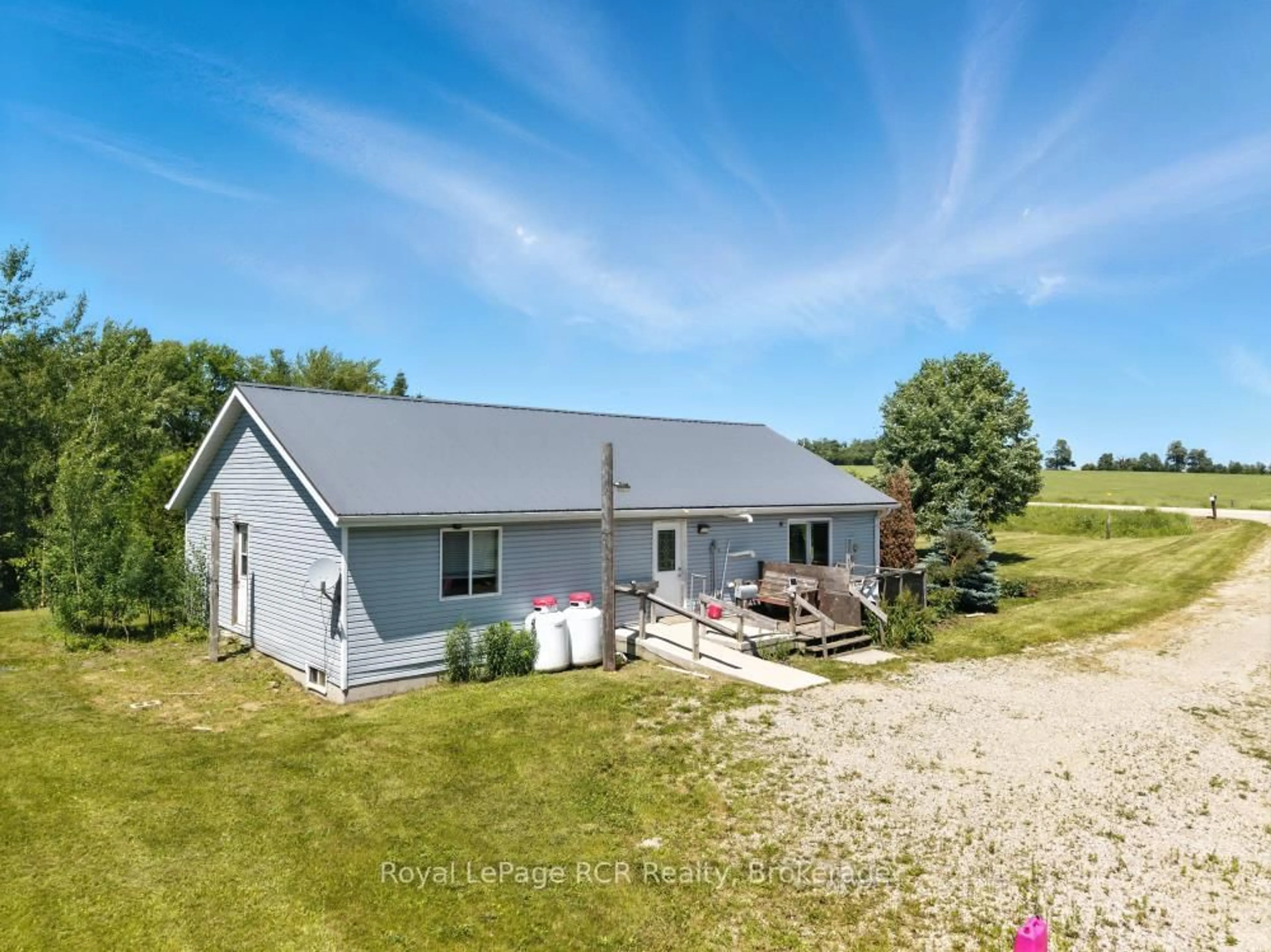 A pic from outside/outdoor area/front of a property/back of a property/a pic from drone, unknown for 9460 Wellington Road 14, Wellington North Ontario N0G 1N0