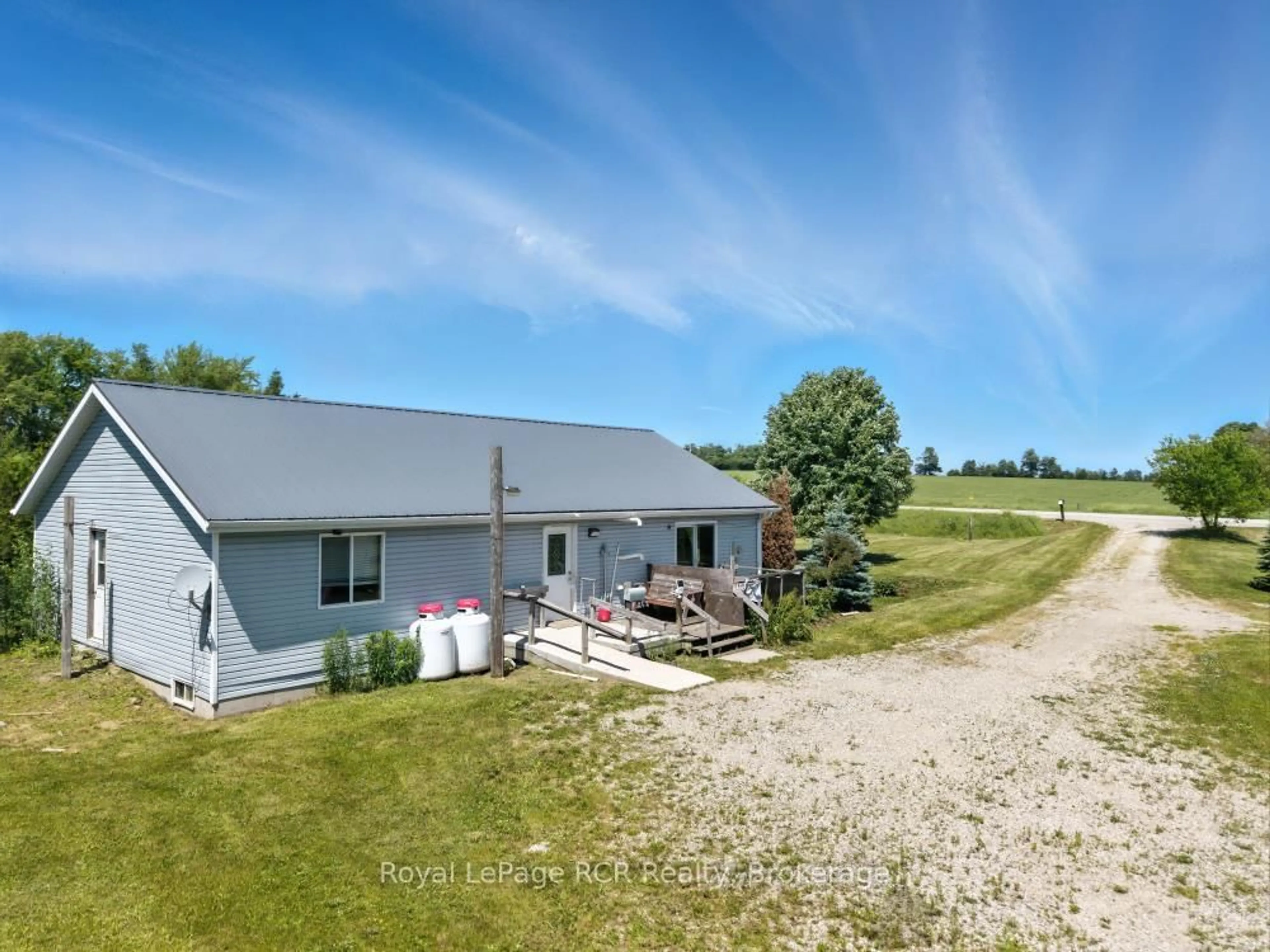 A pic from outside/outdoor area/front of a property/back of a property/a pic from drone, unknown for 9460 Wellington Road 14, Wellington North Ontario N0G 1N0