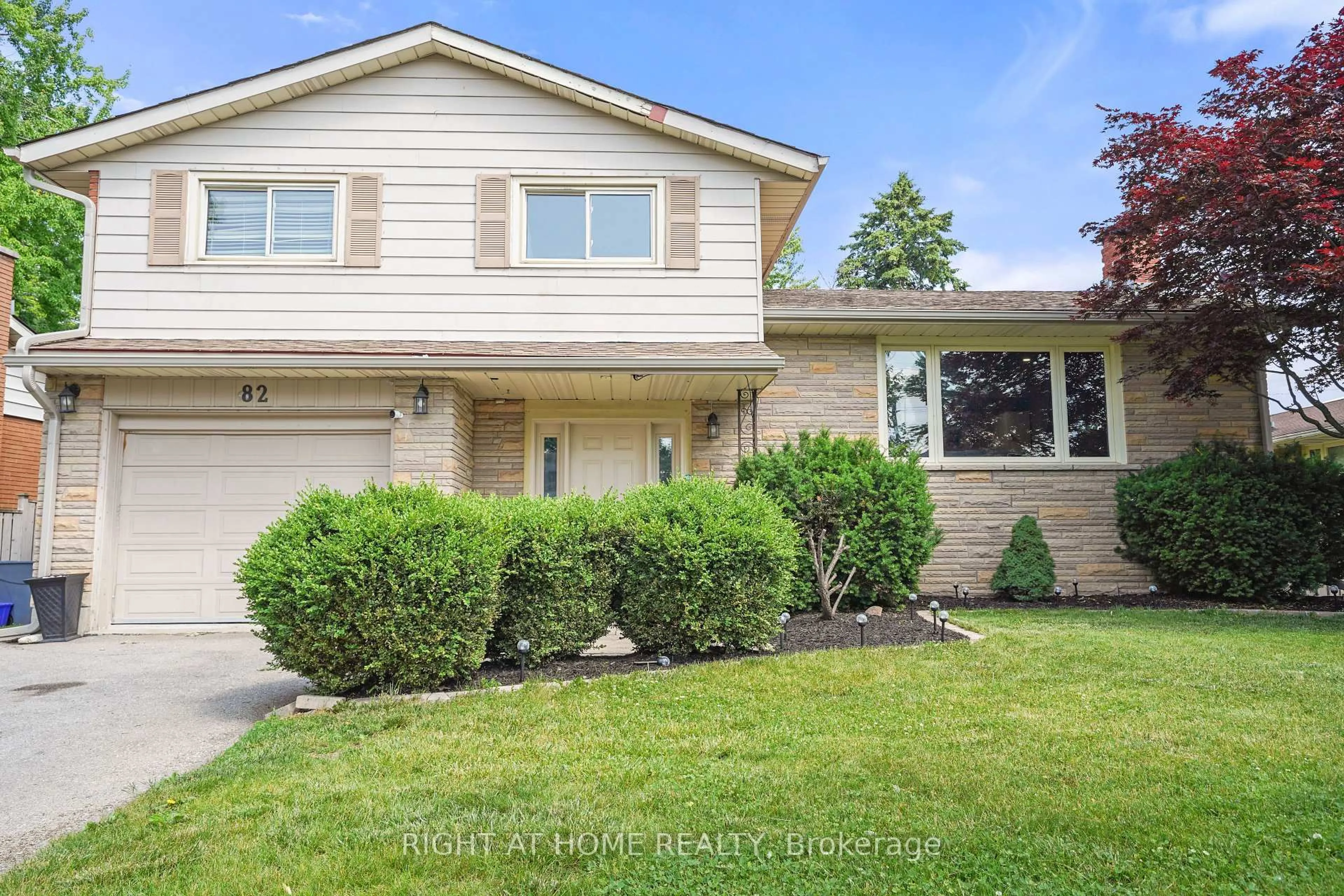 Home with vinyl exterior material, street for 82 Dreger Ave, Kitchener Ontario N2A 2A6