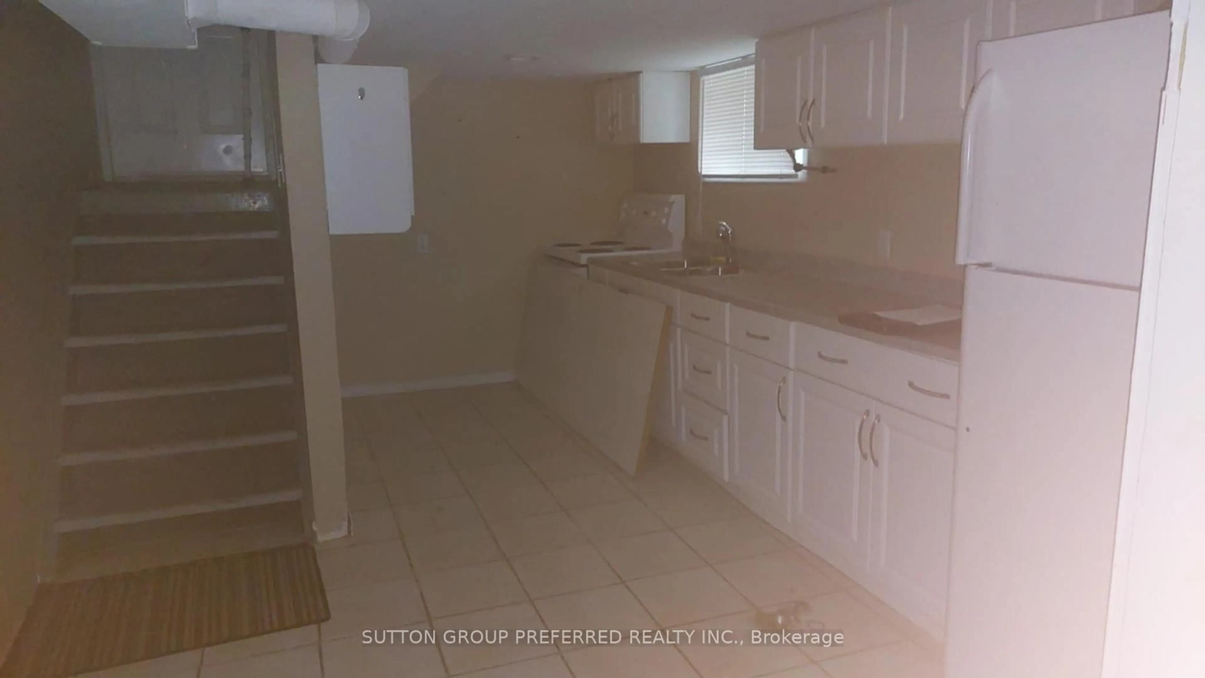 Kitchen with laundary machines, unknown for 117 Wharncliffe Rd, London North Ontario N6H 2A8