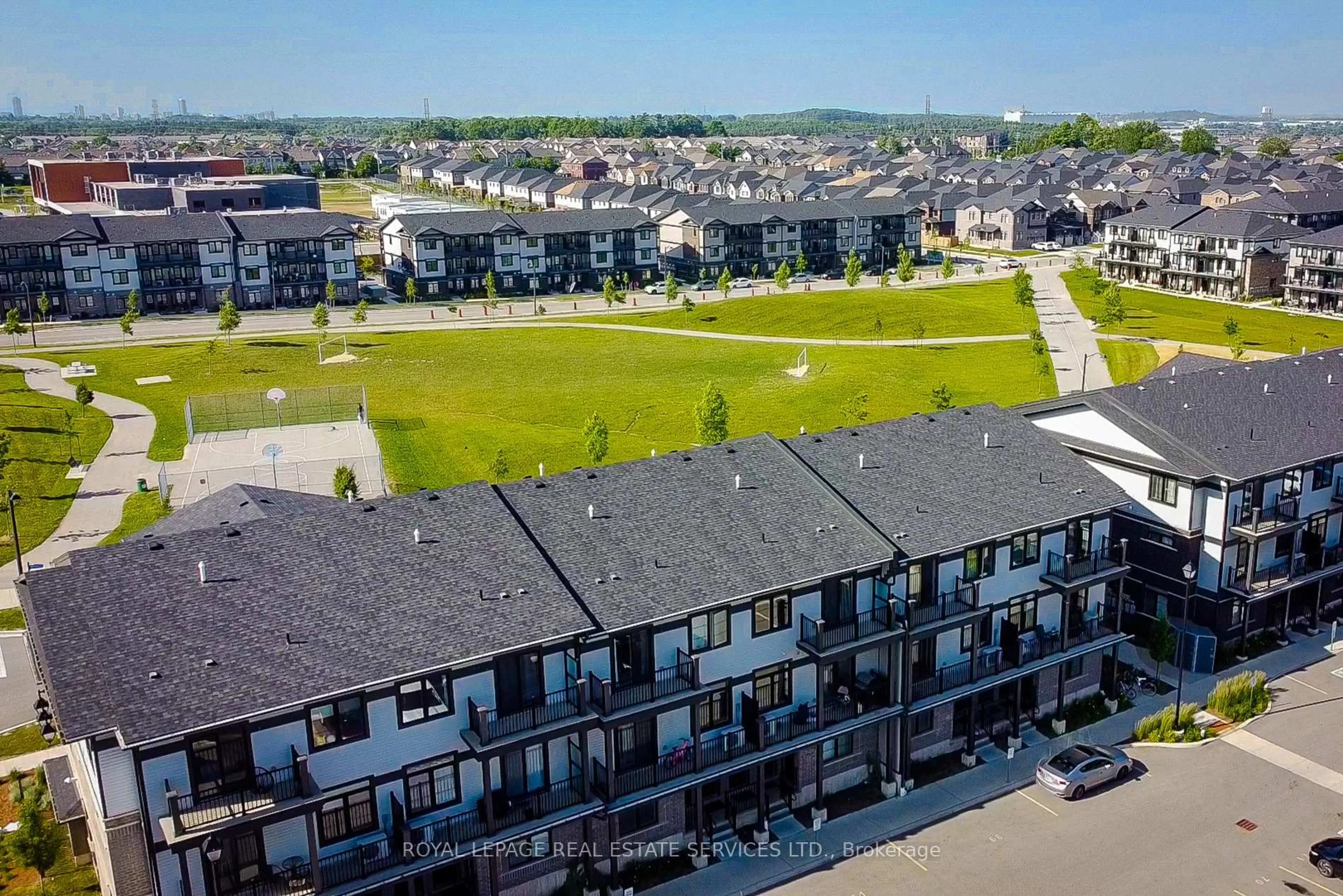 A pic from outside/outdoor area/front of a property/back of a property/a pic from drone, city buildings view from balcony for 122 Wheat Lane, Kitchener Ontario N2R 0R4