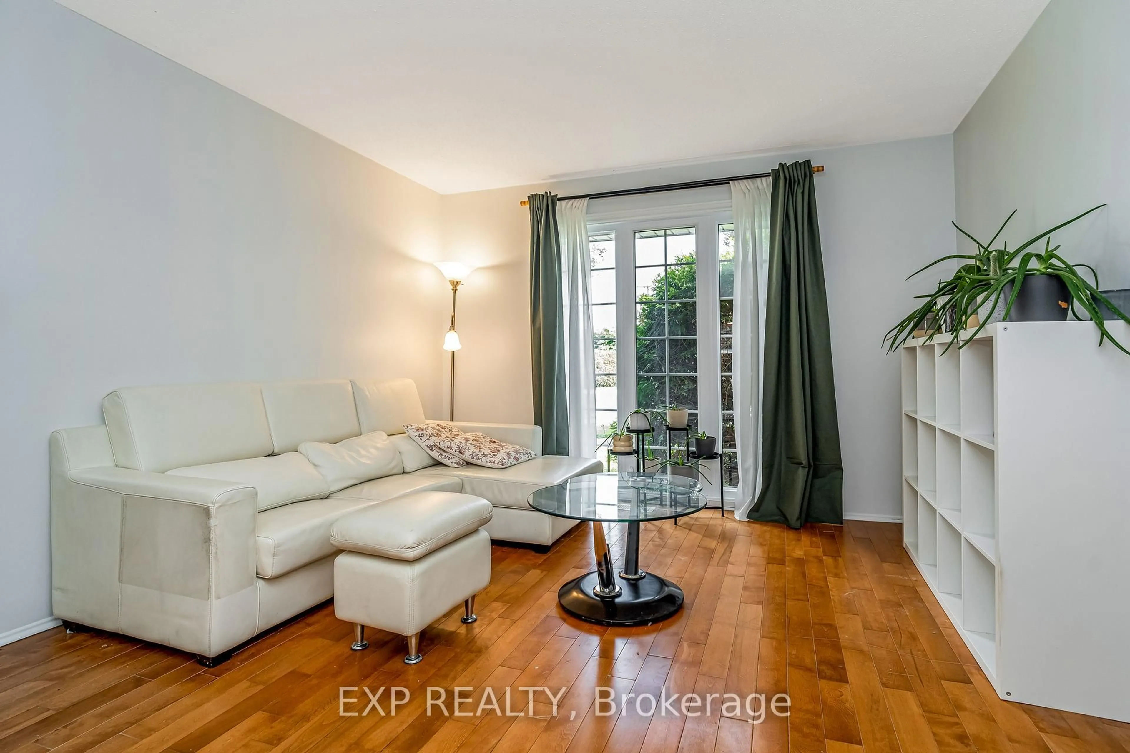 Living room with furniture, unknown for 1029 Meadowlands Dr #65, Ottawa Ontario K2C 0K5