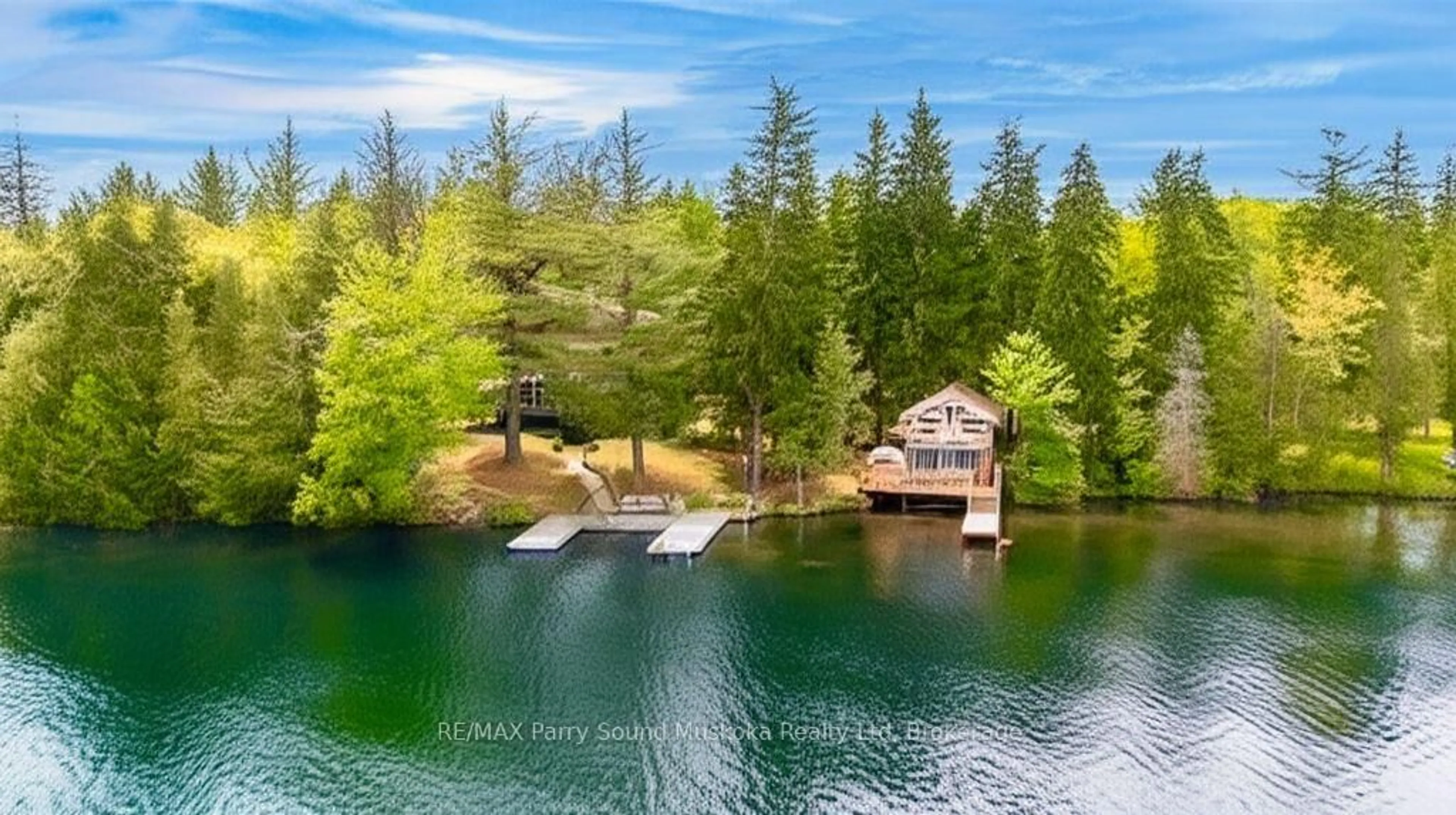 A pic from outside/outdoor area/front of a property/back of a property/a pic from drone, water/lake/river/ocean view for 3A Barnsdale Lane, Seguin Ontario P0C 1H0