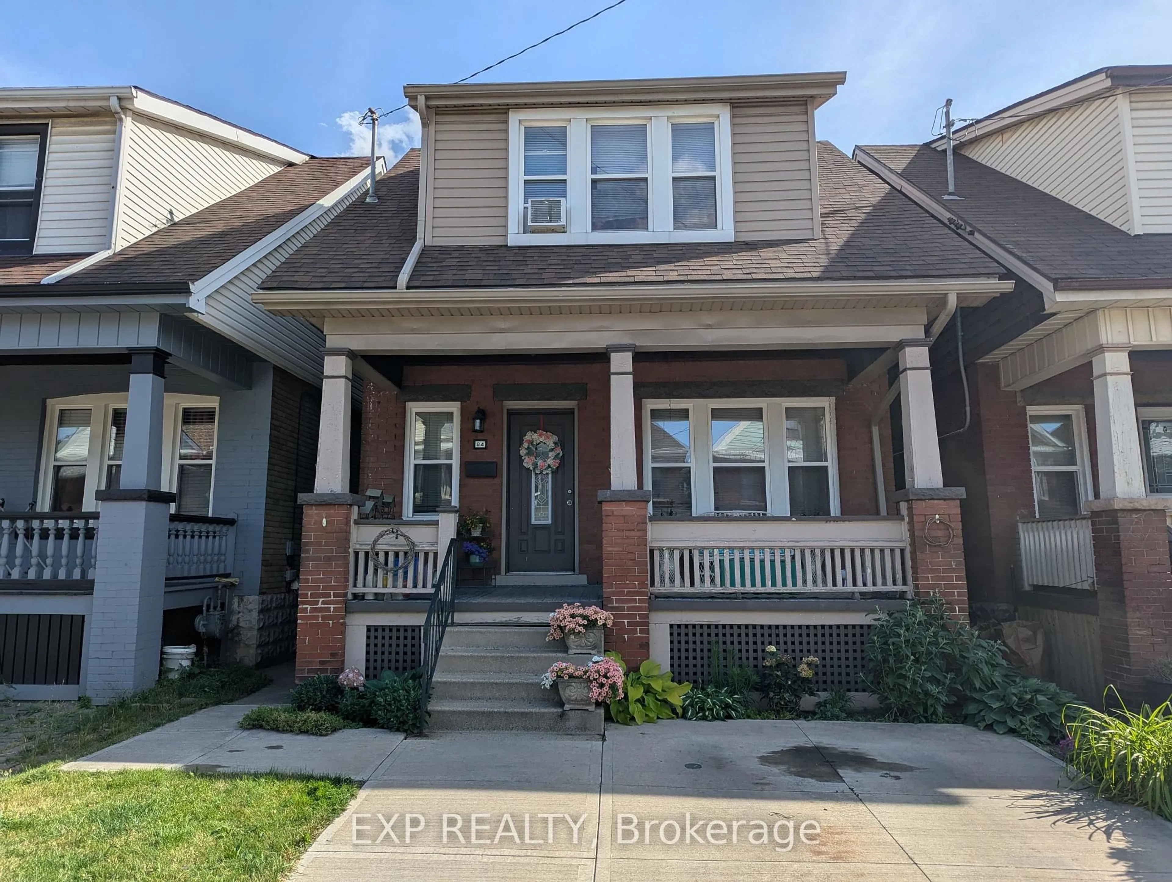 Home with brick exterior material, street for 84 Somerset Ave, Hamilton Ontario L8L 2L7