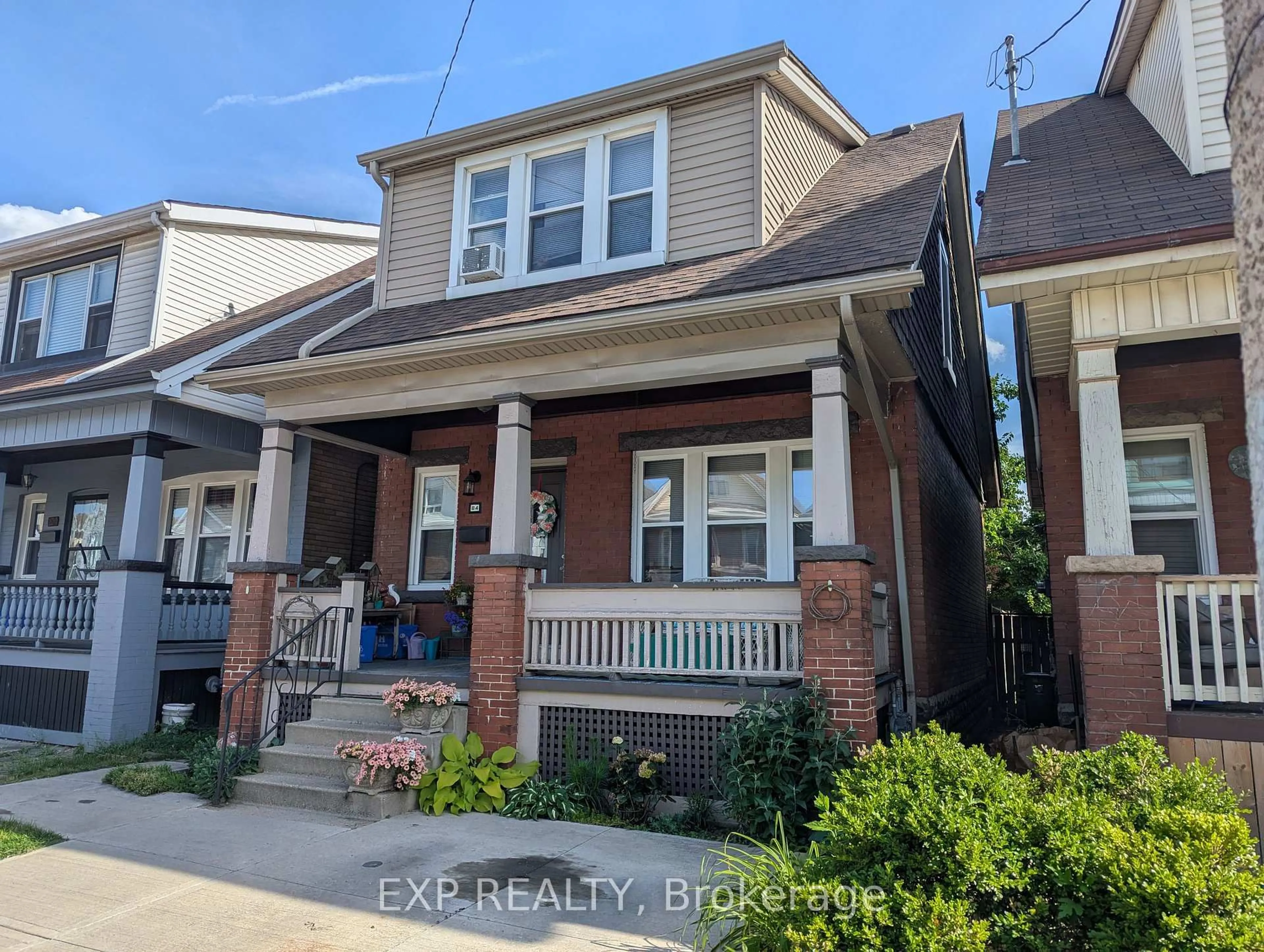 Home with brick exterior material, street for 84 Somerset Ave, Hamilton Ontario L8L 2L7