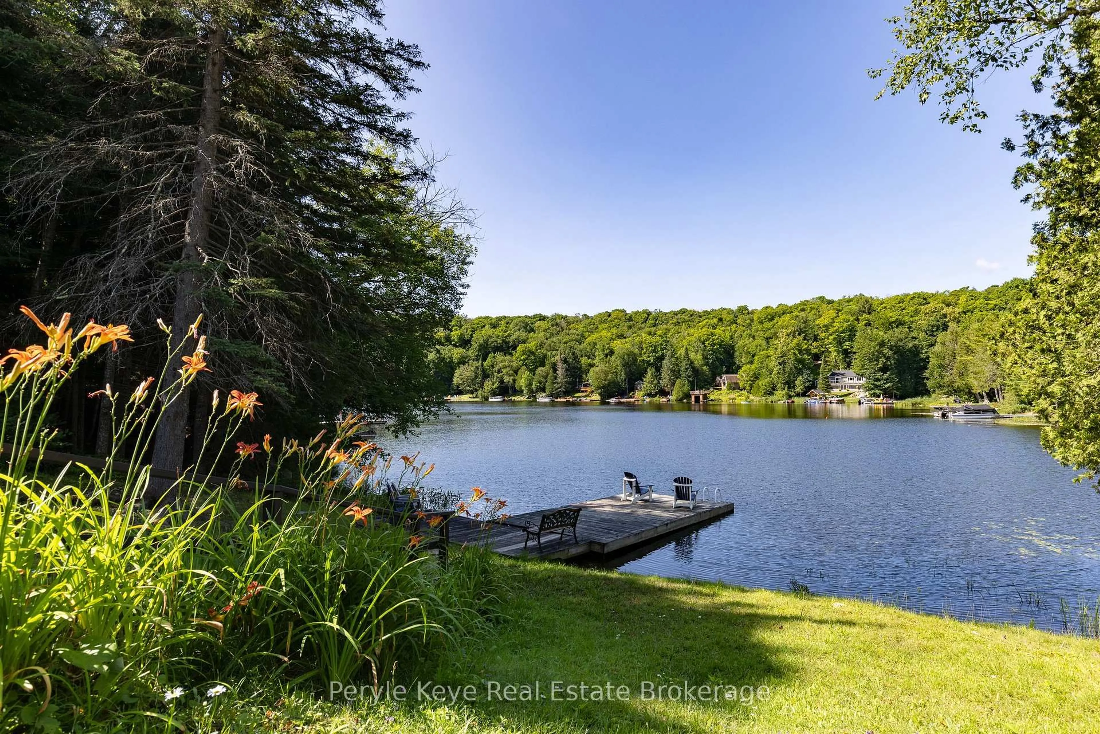 A pic from outside/outdoor area/front of a property/back of a property/a pic from drone, water/lake/river/ocean view for 1305 Bellwood Acres Rd, Lake of Bays Ontario P0B 1A0