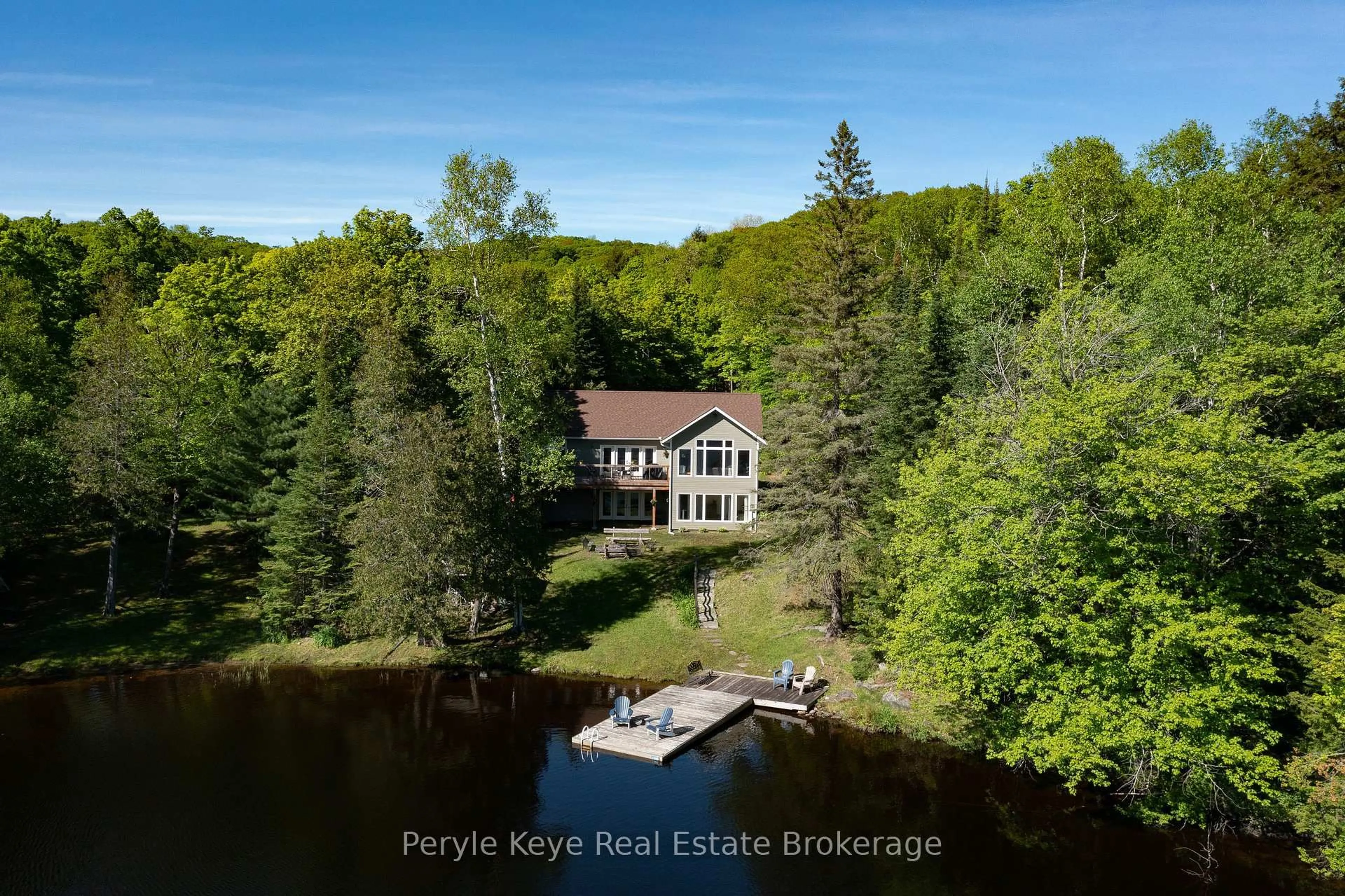 A pic from outside/outdoor area/front of a property/back of a property/a pic from drone, water/lake/river/ocean view for 1305 Bellwood Acres Rd, Lake of Bays Ontario P0B 1A0