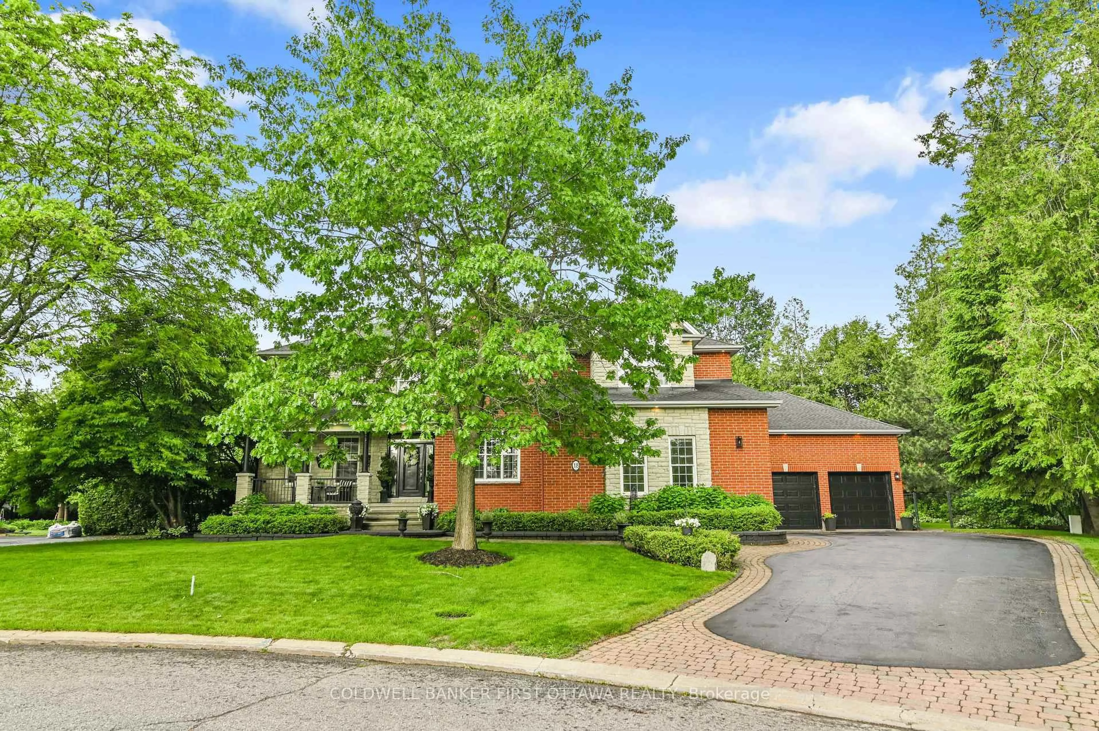 Home with brick exterior material, street for 18 CYPRESS Gdns, Stittsville Ontario K2S 1W6