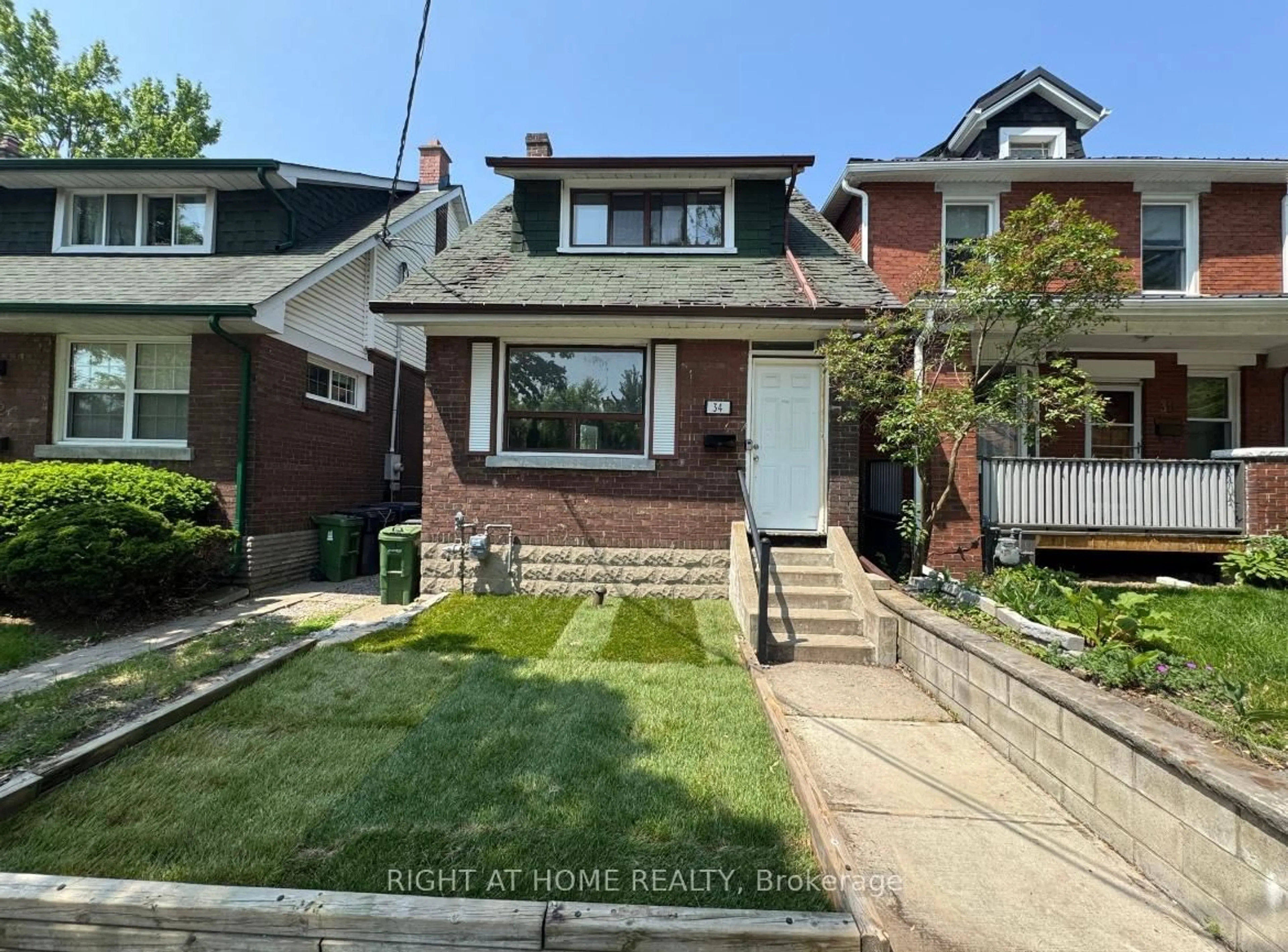 Home with brick exterior material, street for 34 Woodington Ave, Out of Area Ontario M4C 3J3