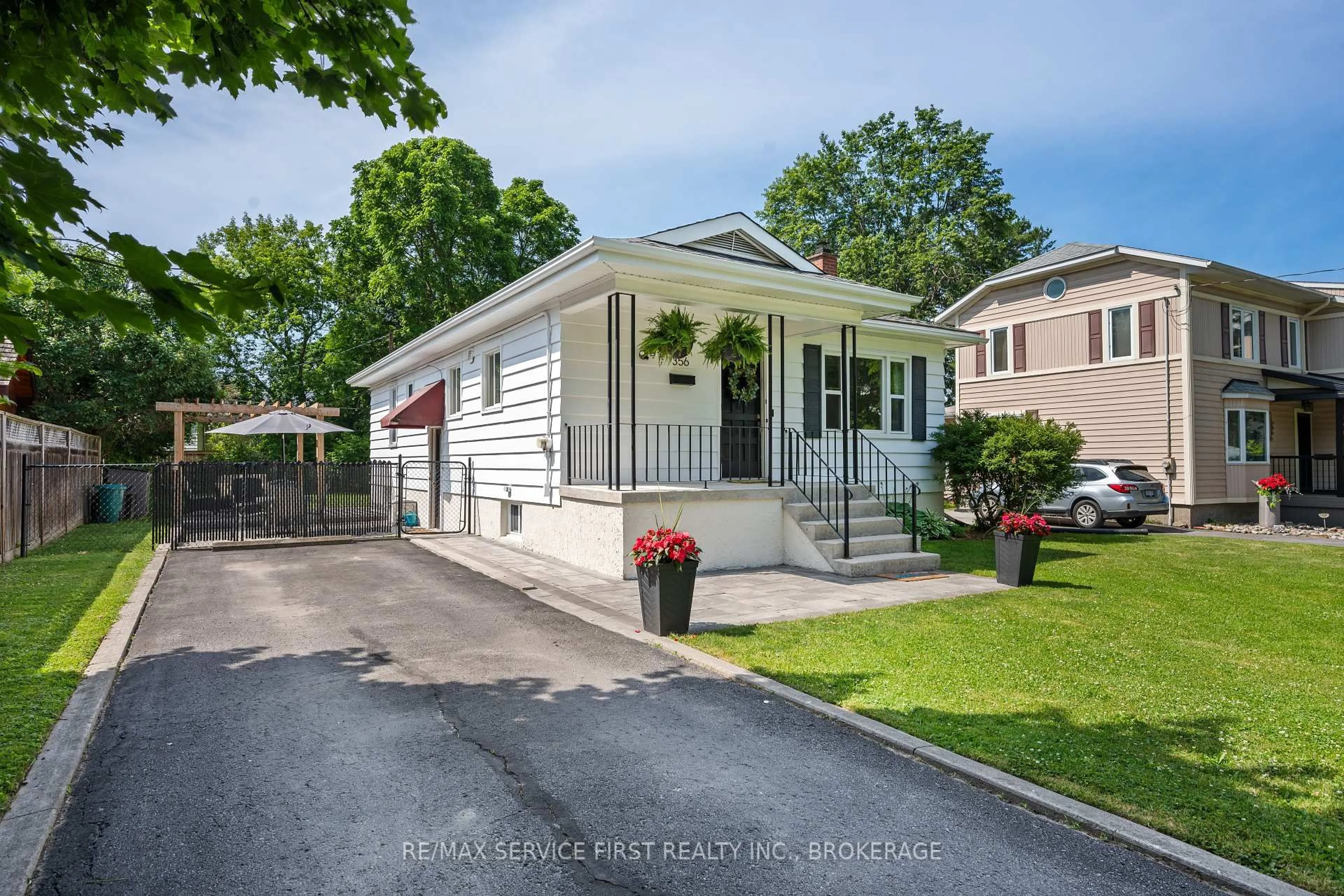 Home with vinyl exterior material, street for 356 Glengarry St, Kingston Ontario K7M 3K2