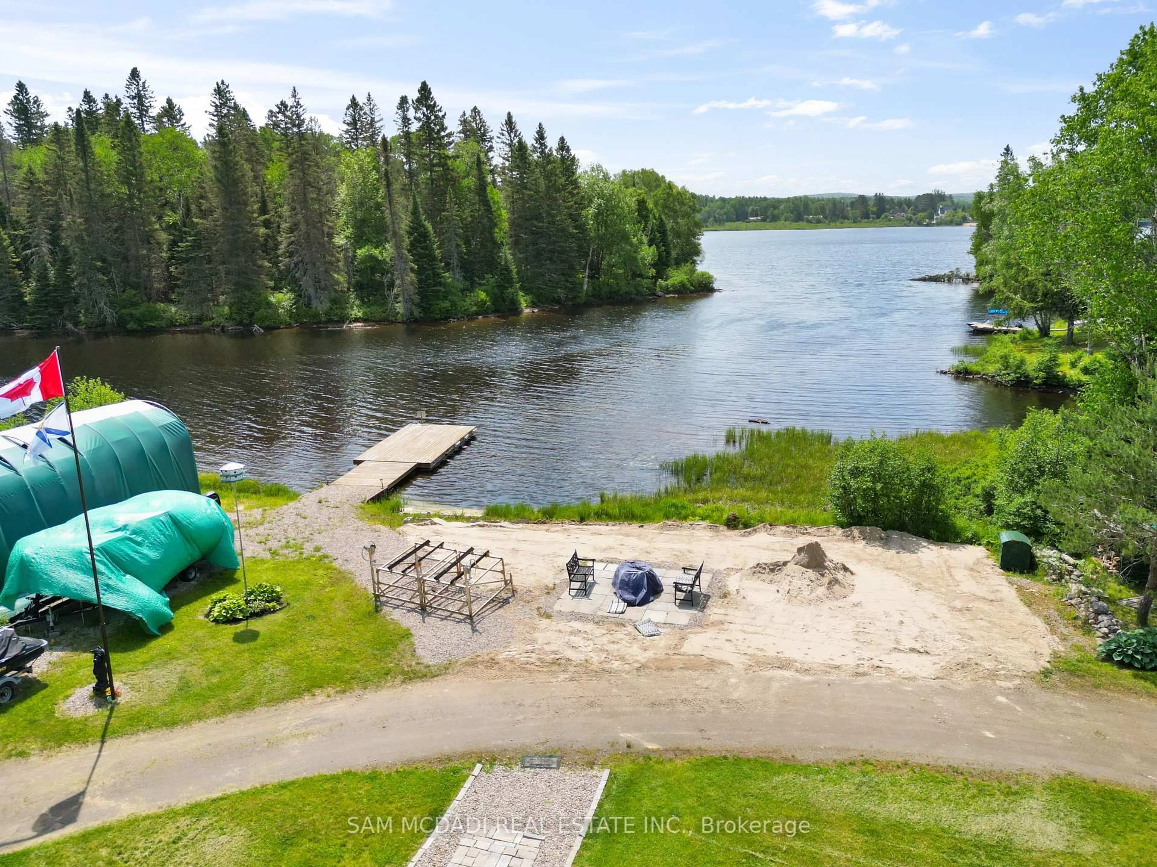 A pic from outside/outdoor area/front of a property/back of a property/a pic from drone, water/lake/river/ocean view for 37 Rose Dr, Kearney Ontario P0A 1M0