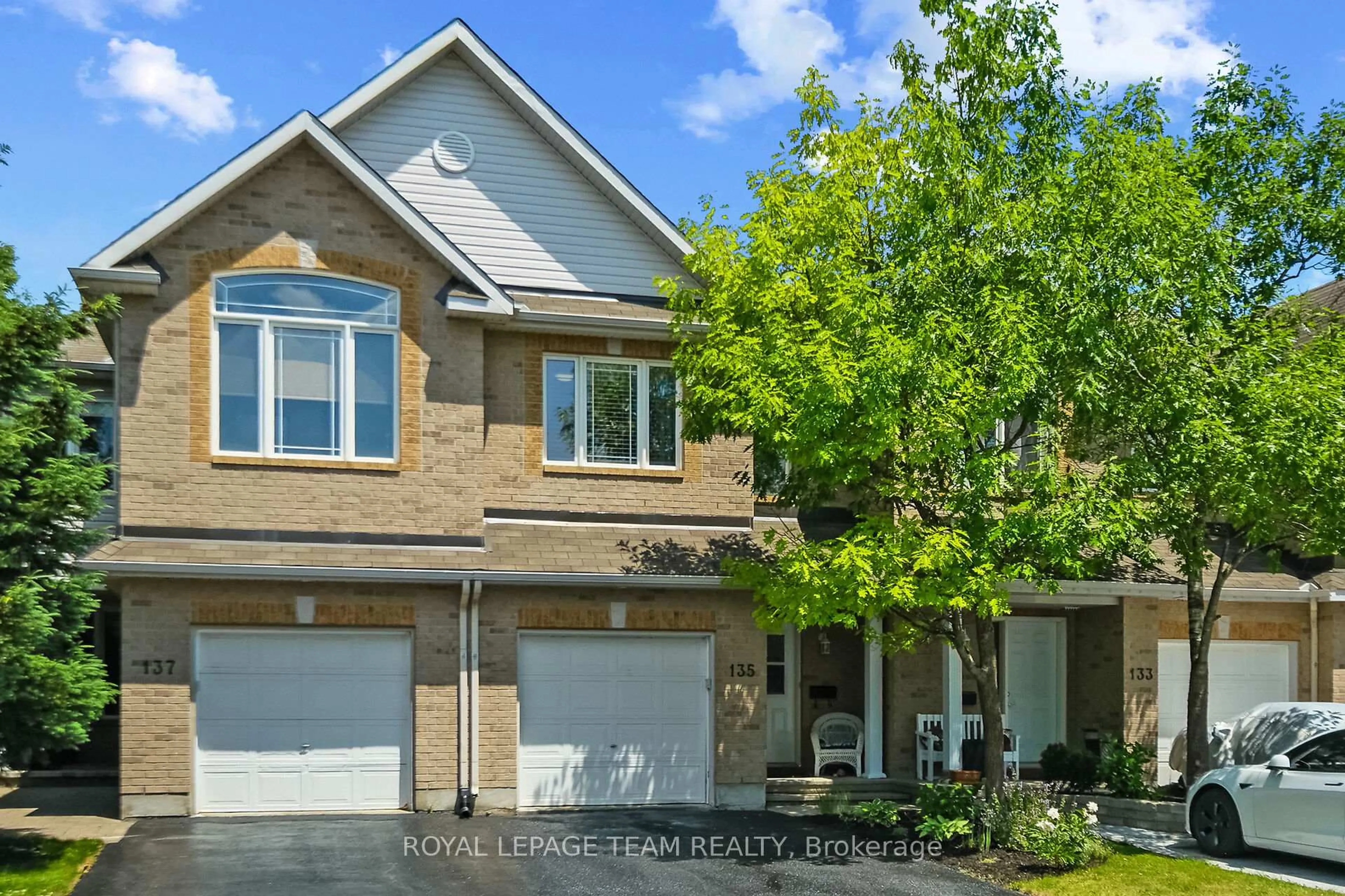 Home with brick exterior material, street for 135 Talltree Cres, Ottawa Ontario K2S 0B1