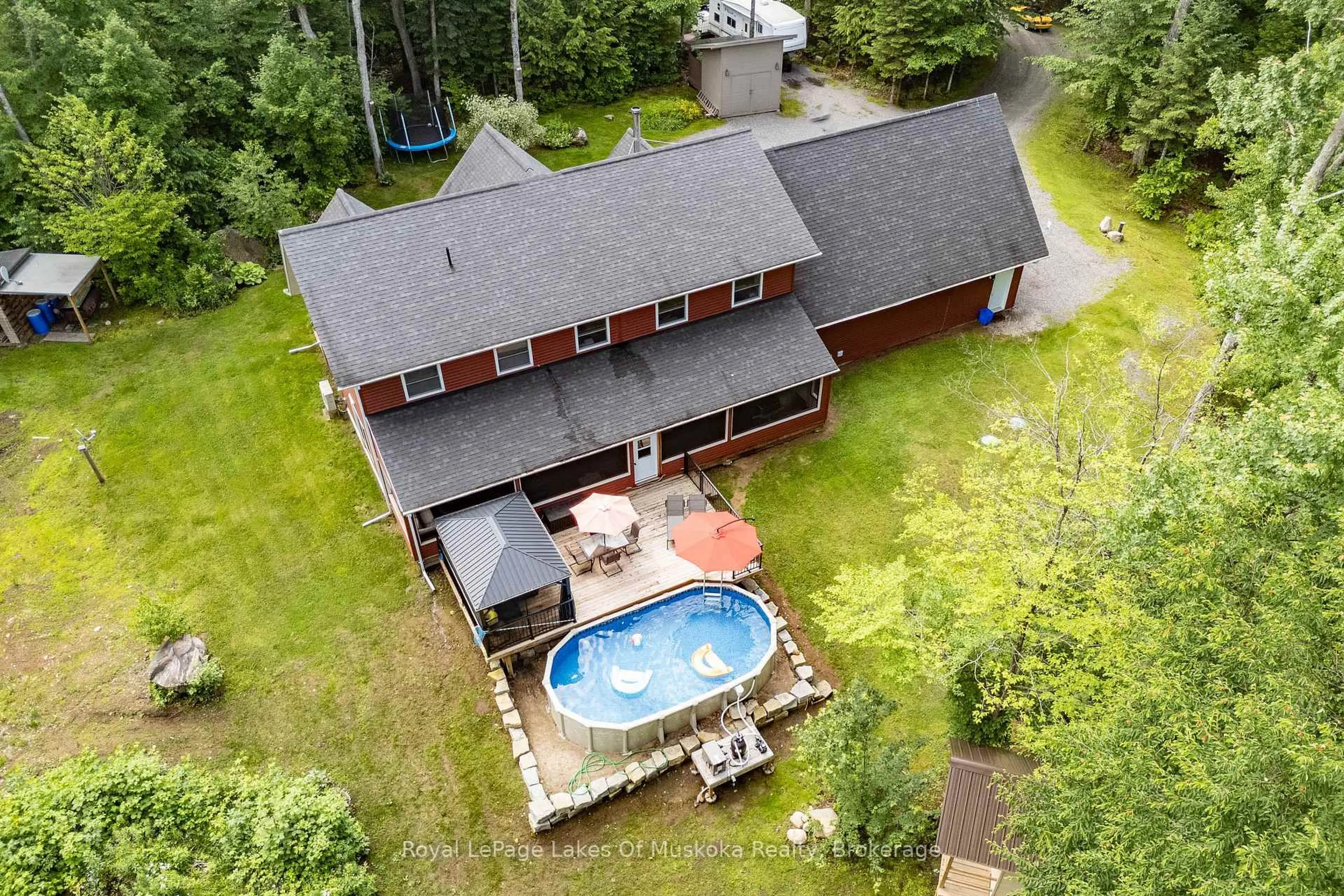A pic from outside/outdoor area/front of a property/back of a property/a pic from drone, water/lake/river/ocean view for 1099 Moot Lake Rd, Lake of Bays Ontario P0B 1A0