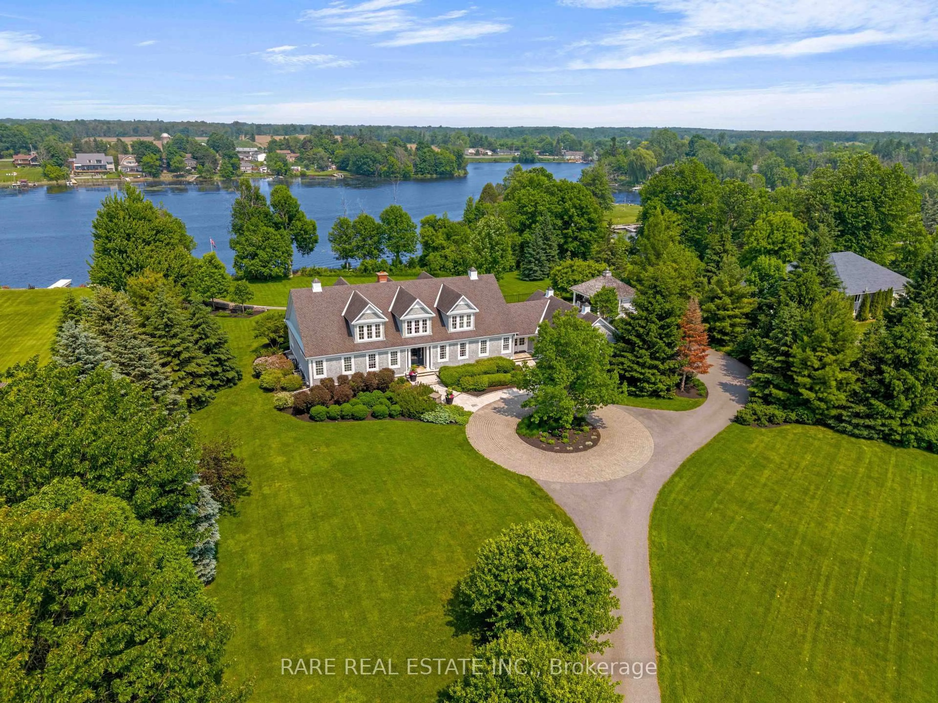 A pic from outside/outdoor area/front of a property/back of a property/a pic from drone, water/lake/river/ocean view for 6029 Rideau Valley Dr, Manotick Ontario K4M 1B3