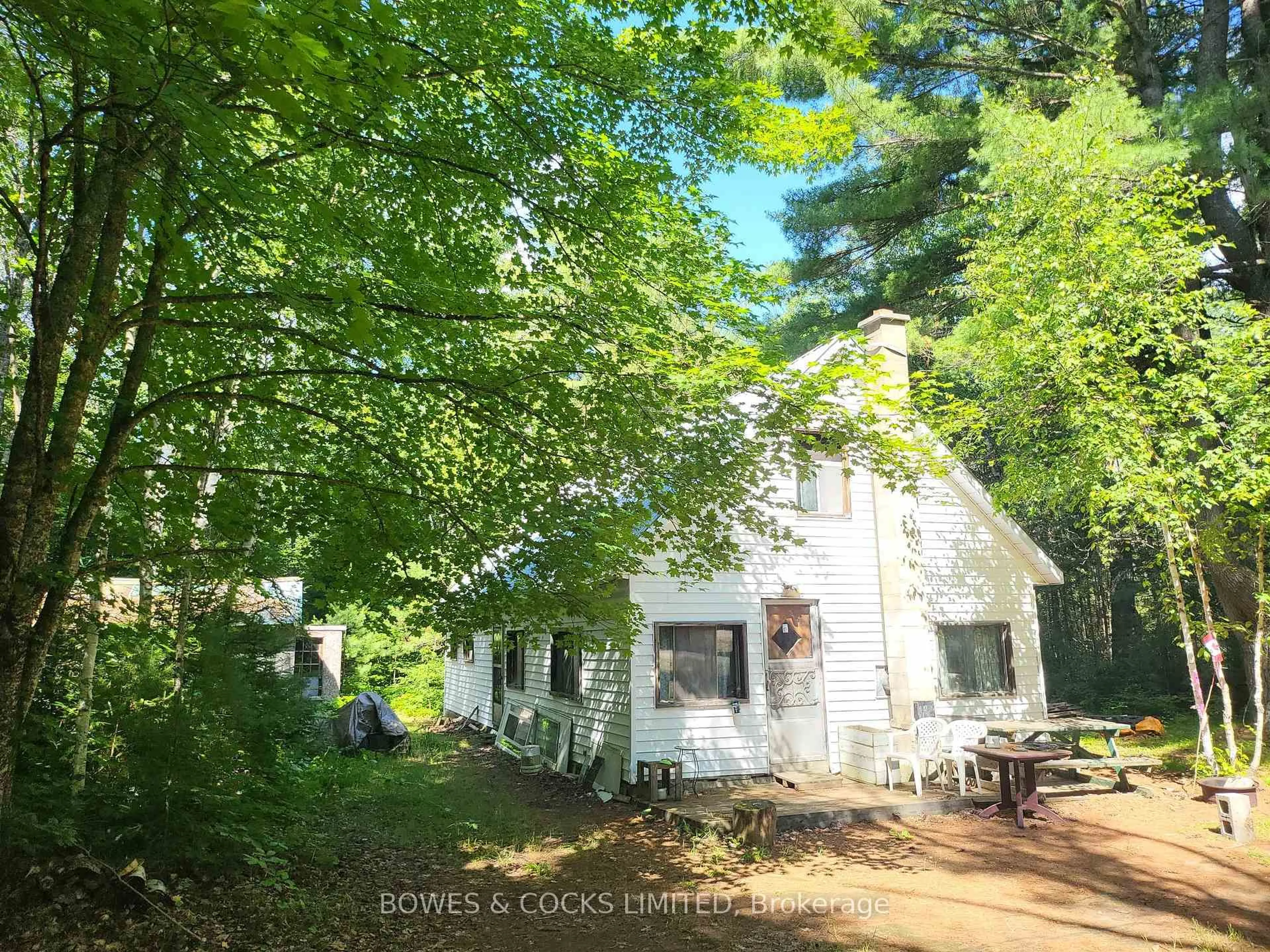 A pic from outside/outdoor area/front of a property/back of a property/a pic from drone, unknown for 24 Robinson Rd, Maynooth Ontario K0L 2S0