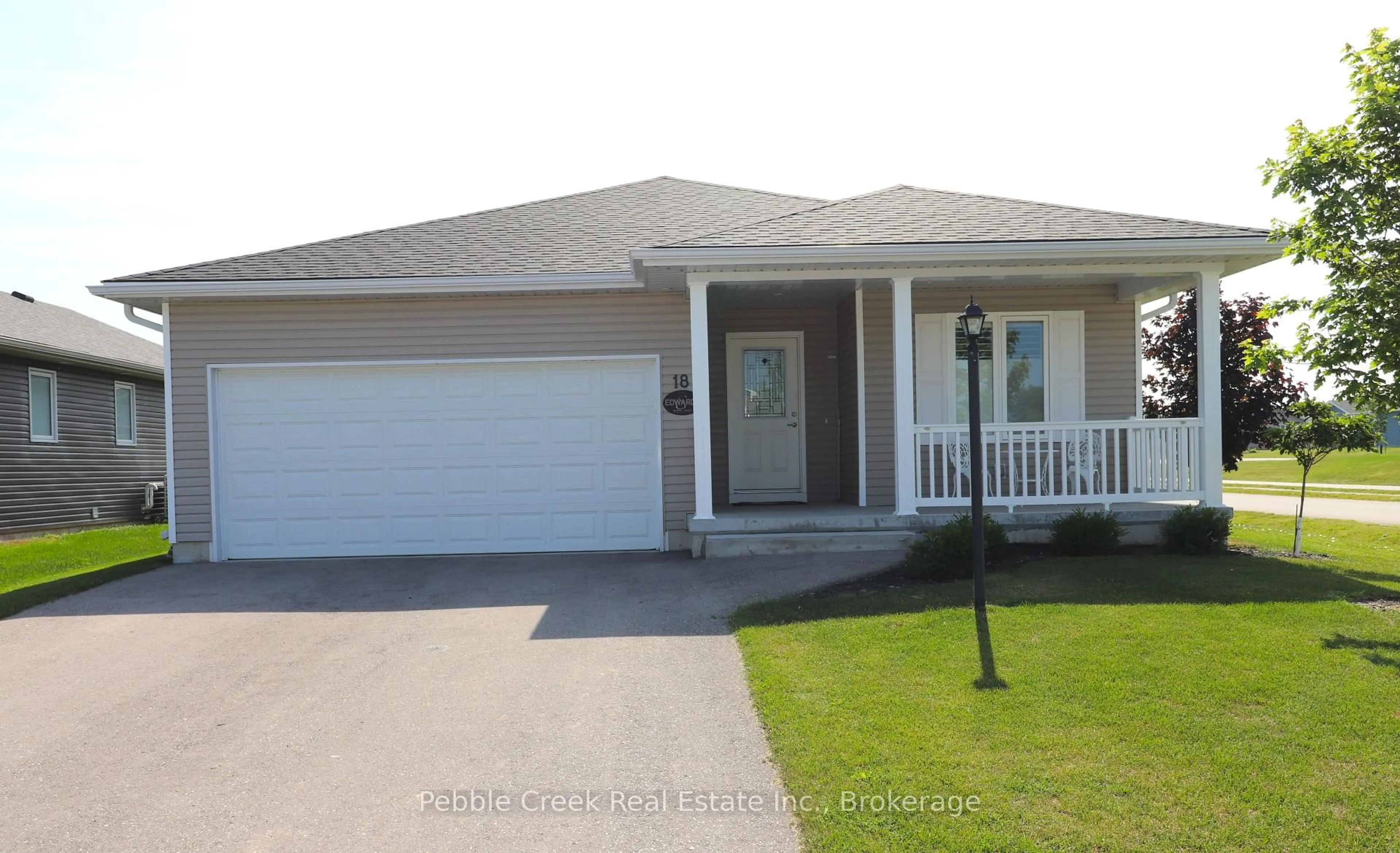 Home with vinyl exterior material, street for 18 Windward Way, Ashfield-Colborne-Wawanosh Ontario N7A 0B2