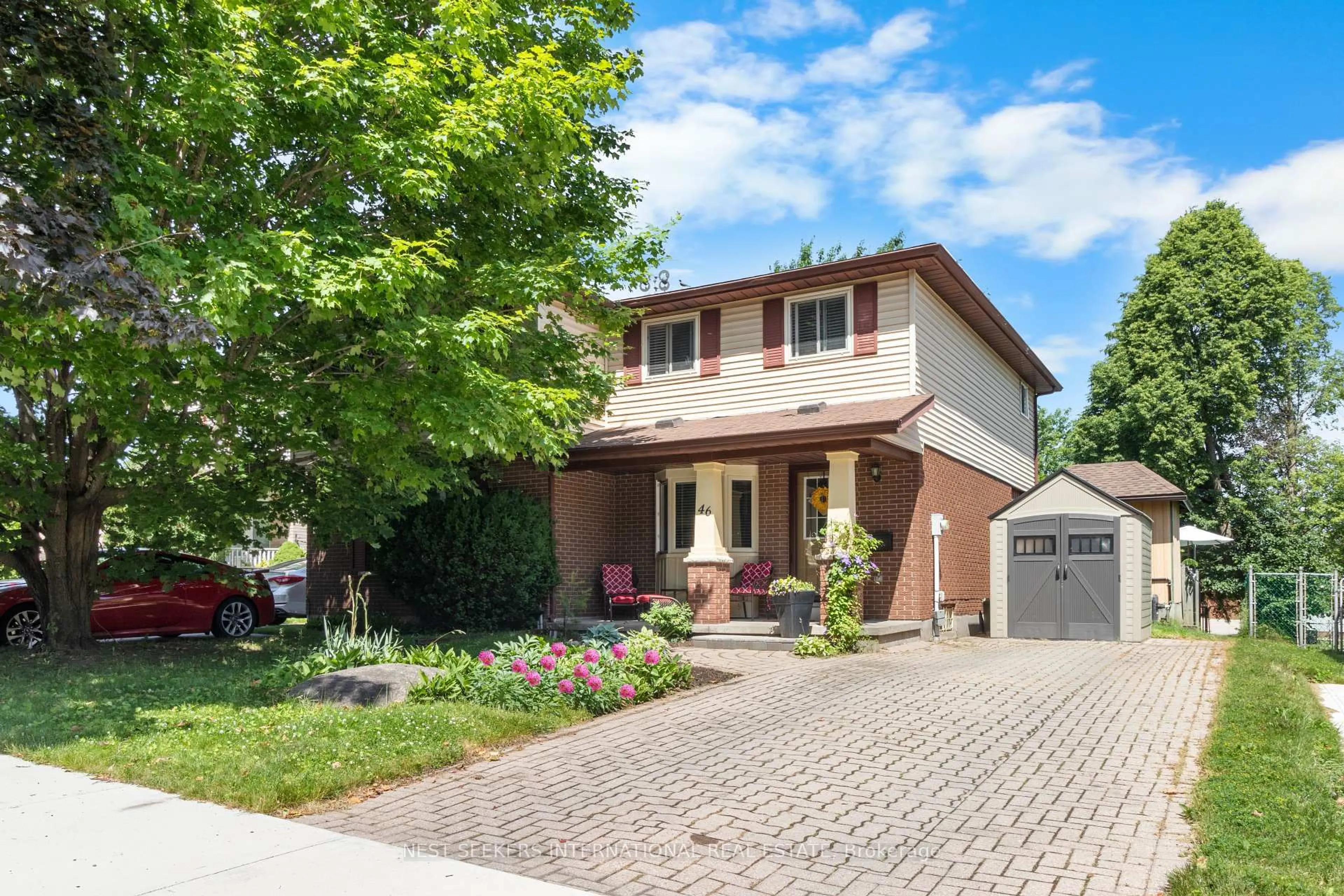 Home with brick exterior material, street for 46 Rosebank Cres, Kitchener Ontario N2E 2R4