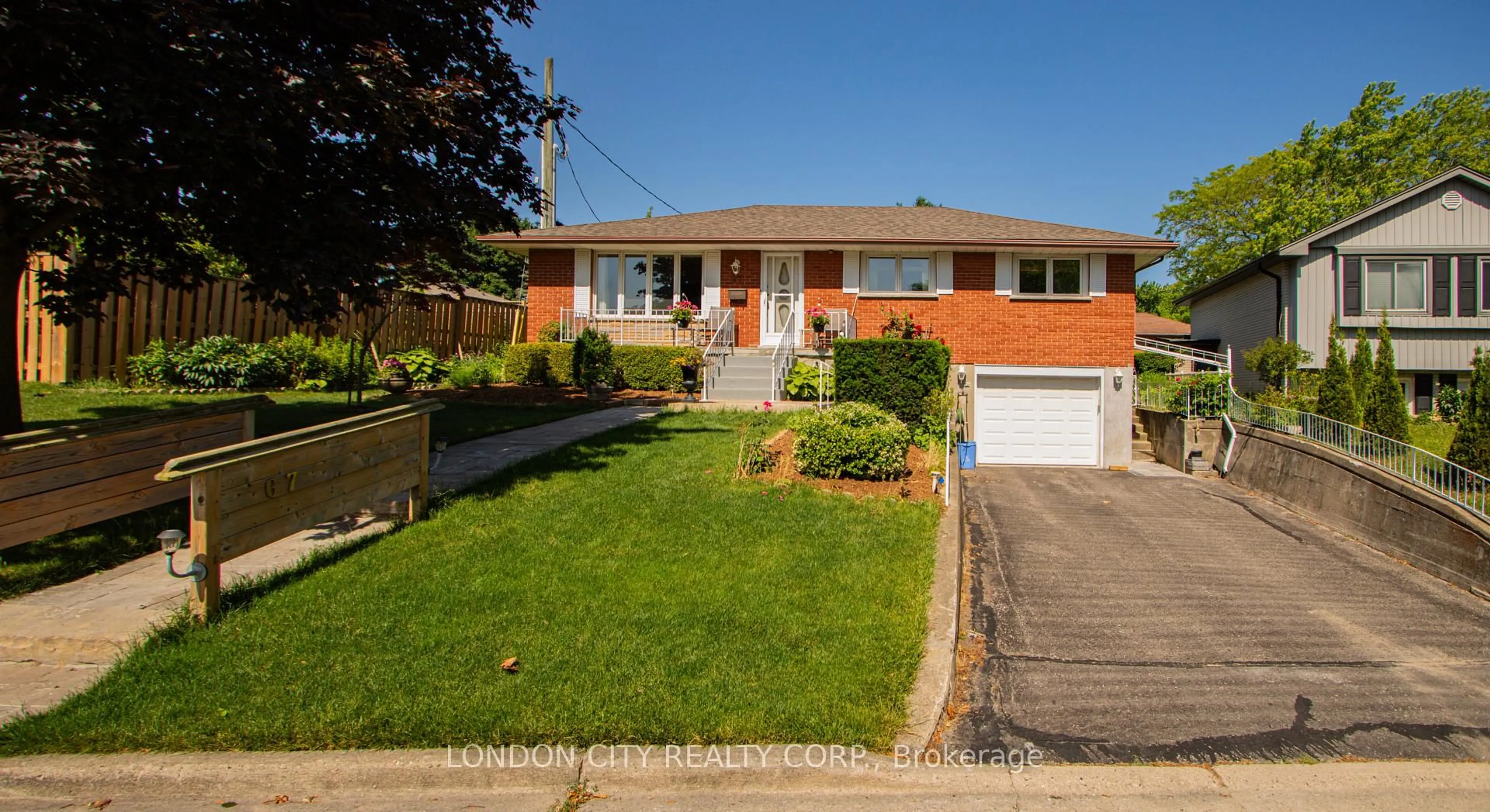 Home with brick exterior material, street for 67 Almond Road. N5Z 4C7 Rd, London South Ontario N5Z 4C7