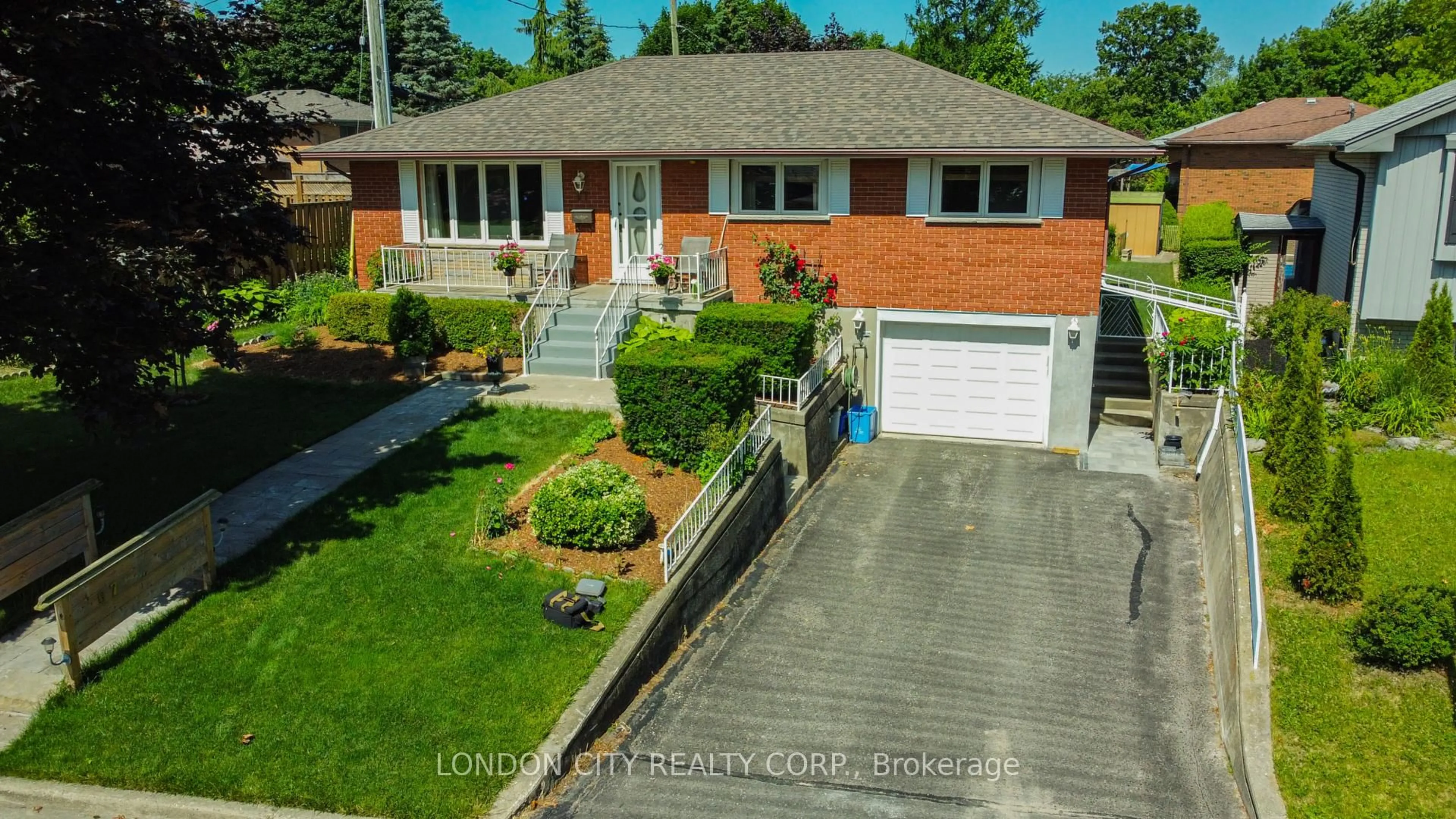 A pic from outside/outdoor area/front of a property/back of a property/a pic from drone, street for 67 Almond Road. N5Z 4C7 Rd, London South Ontario N5Z 4C7