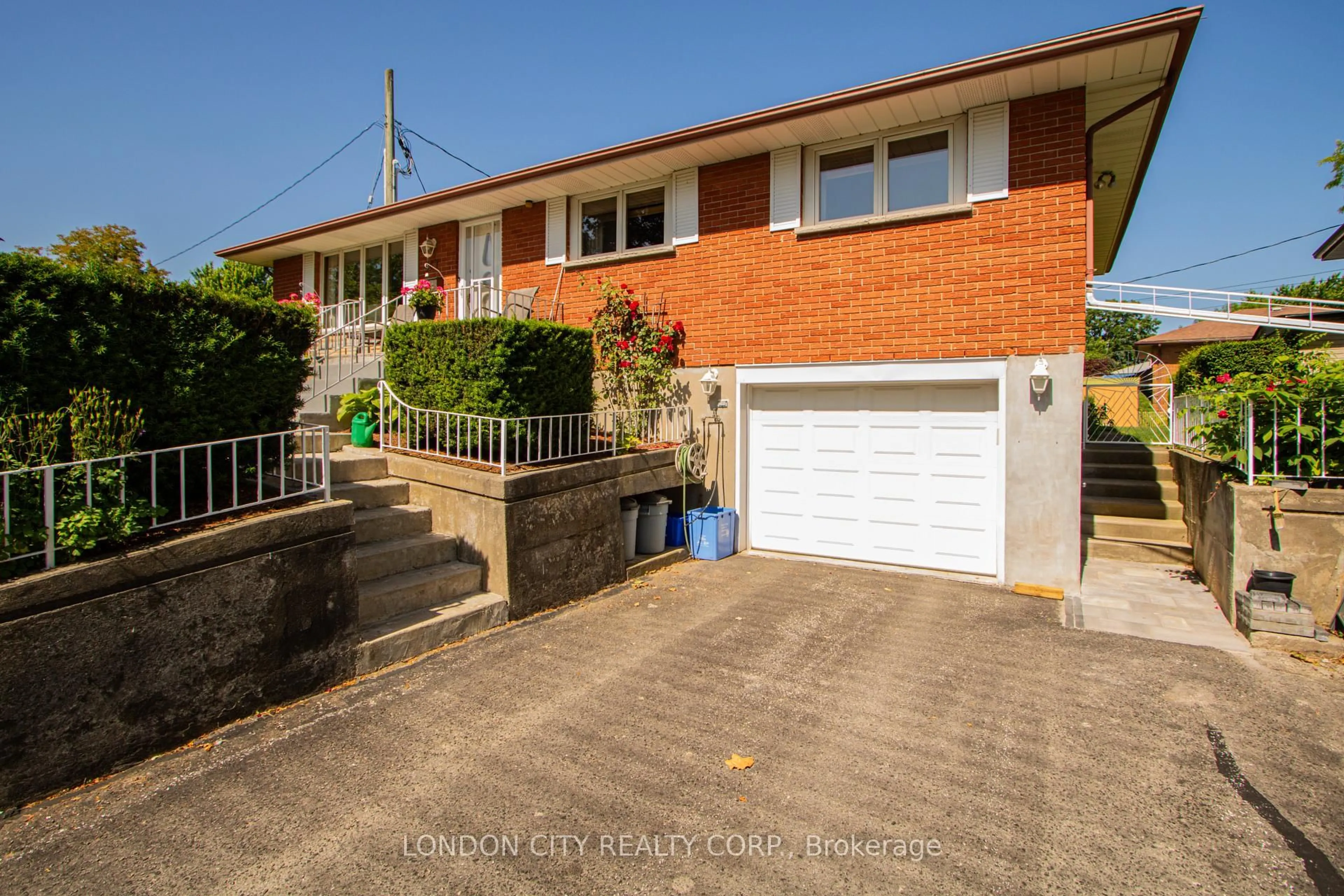 A pic from outside/outdoor area/front of a property/back of a property/a pic from drone, street for 67 Almond Road. N5Z 4C7 Rd, London South Ontario N5Z 4C7