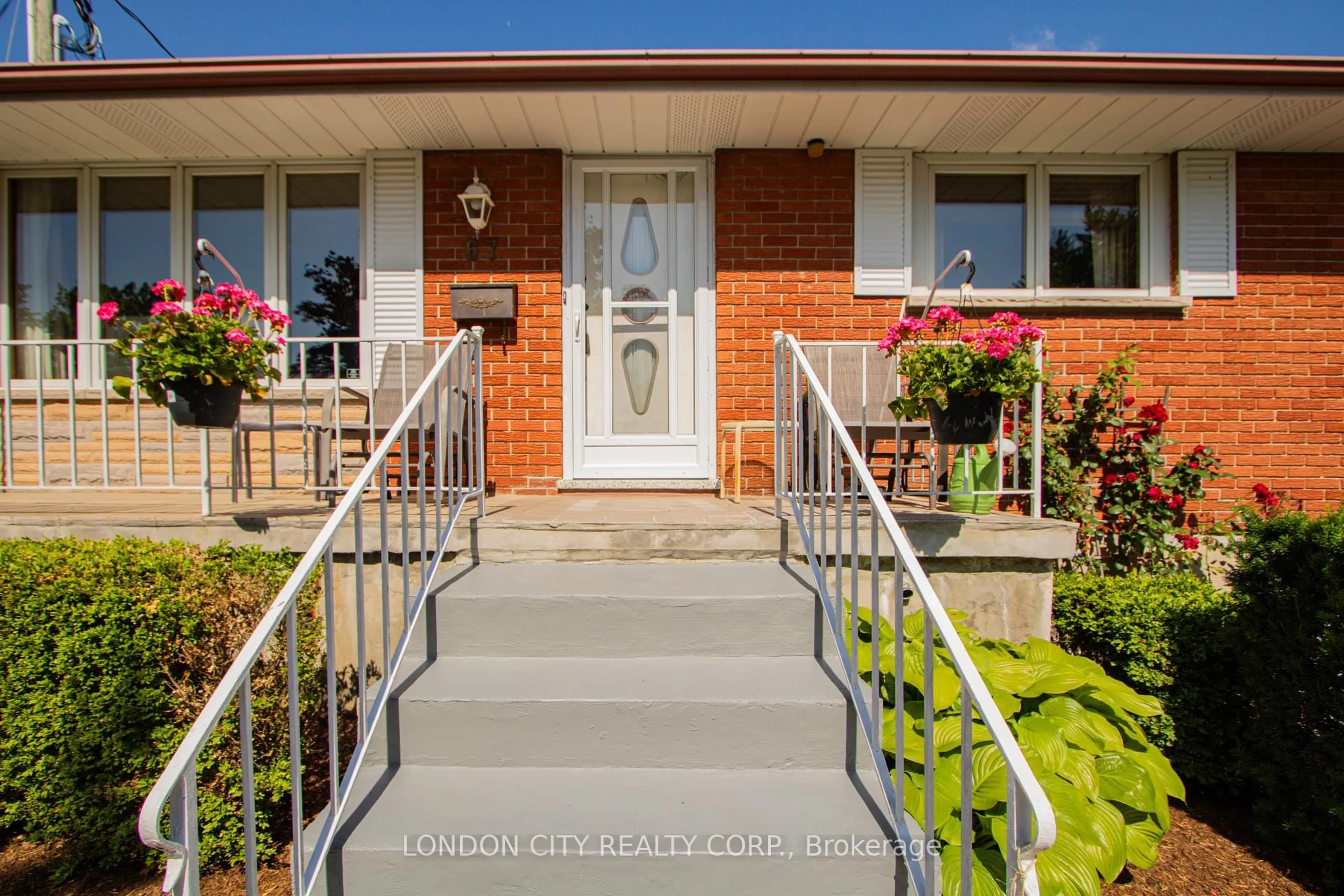 Home with brick exterior material, street for 67 Almond Road. N5Z 4C7 Rd, London South Ontario N5Z 4C7