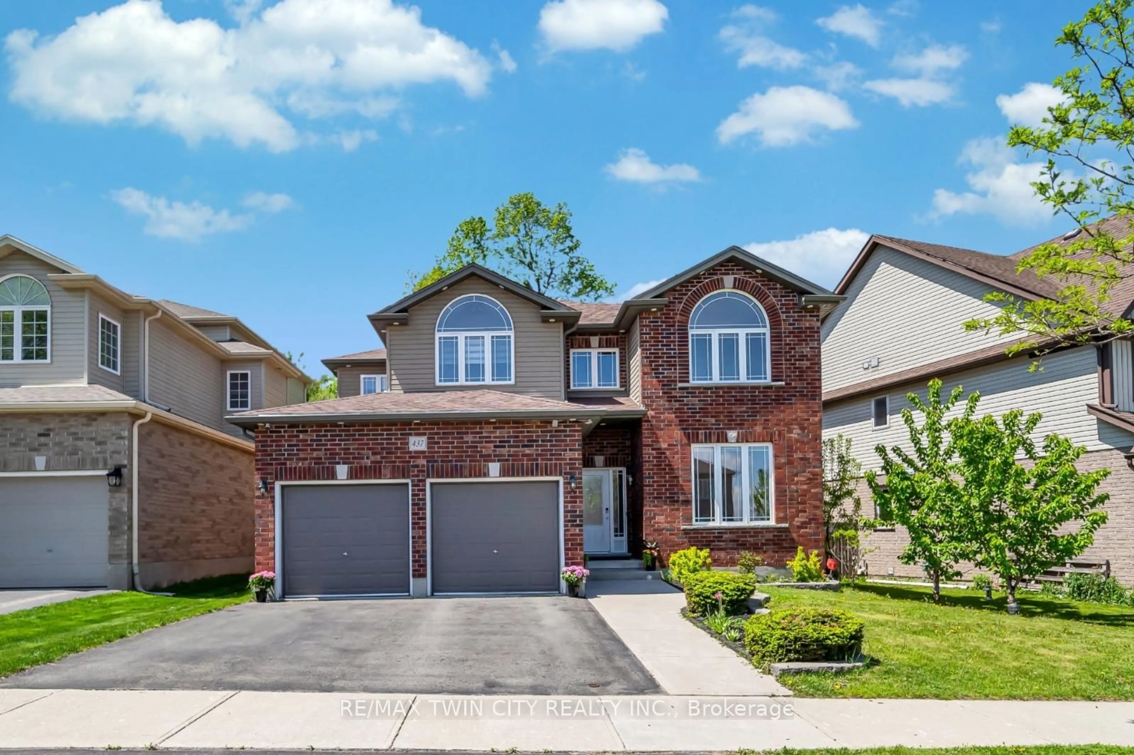 Home with brick exterior material, street for 437 Zeller Dr, Kitchener Ontario N2A 4M4