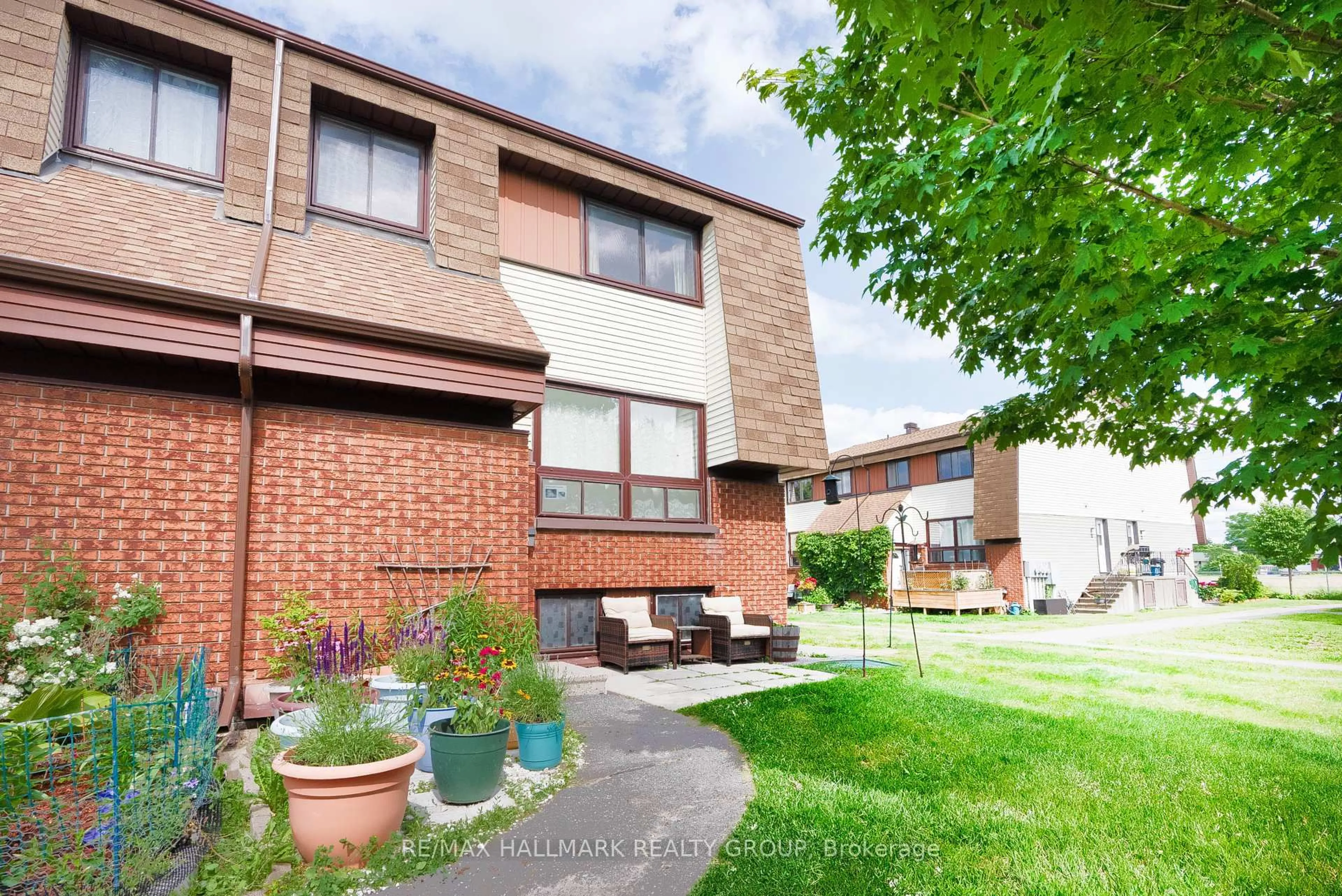 Home with brick exterior material, unknown for 22 Woodvale Green #D, Nepean Ontario K2G 4H2