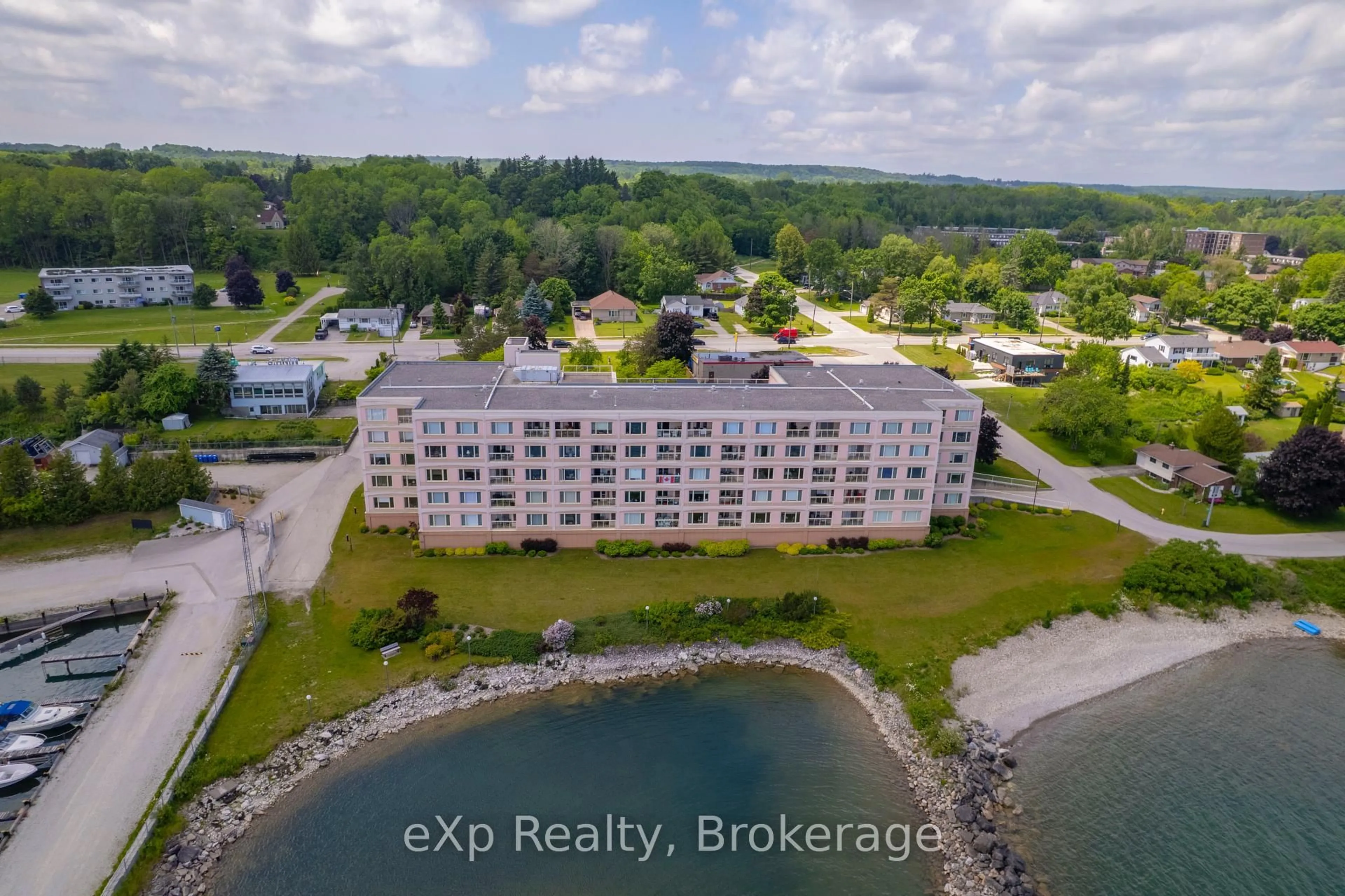 A pic from outside/outdoor area/front of a property/back of a property/a pic from drone, water/lake/river/ocean view for 2555 3rd Ave #309, Georgian Bluffs Ontario N4K 6T8