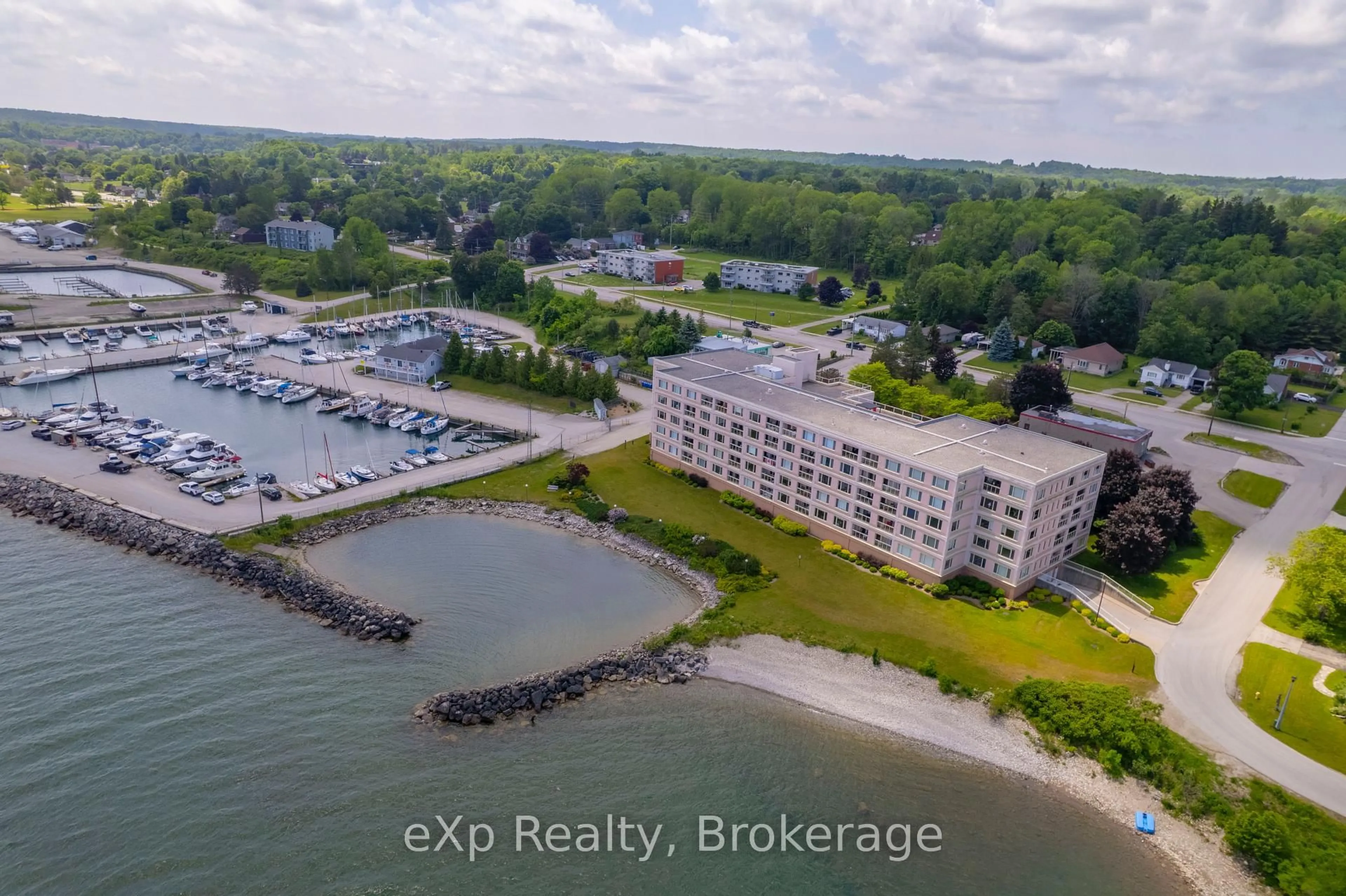 A pic from outside/outdoor area/front of a property/back of a property/a pic from drone, water/lake/river/ocean view for 2555 3rd Ave #309, Georgian Bluffs Ontario N4K 6T8