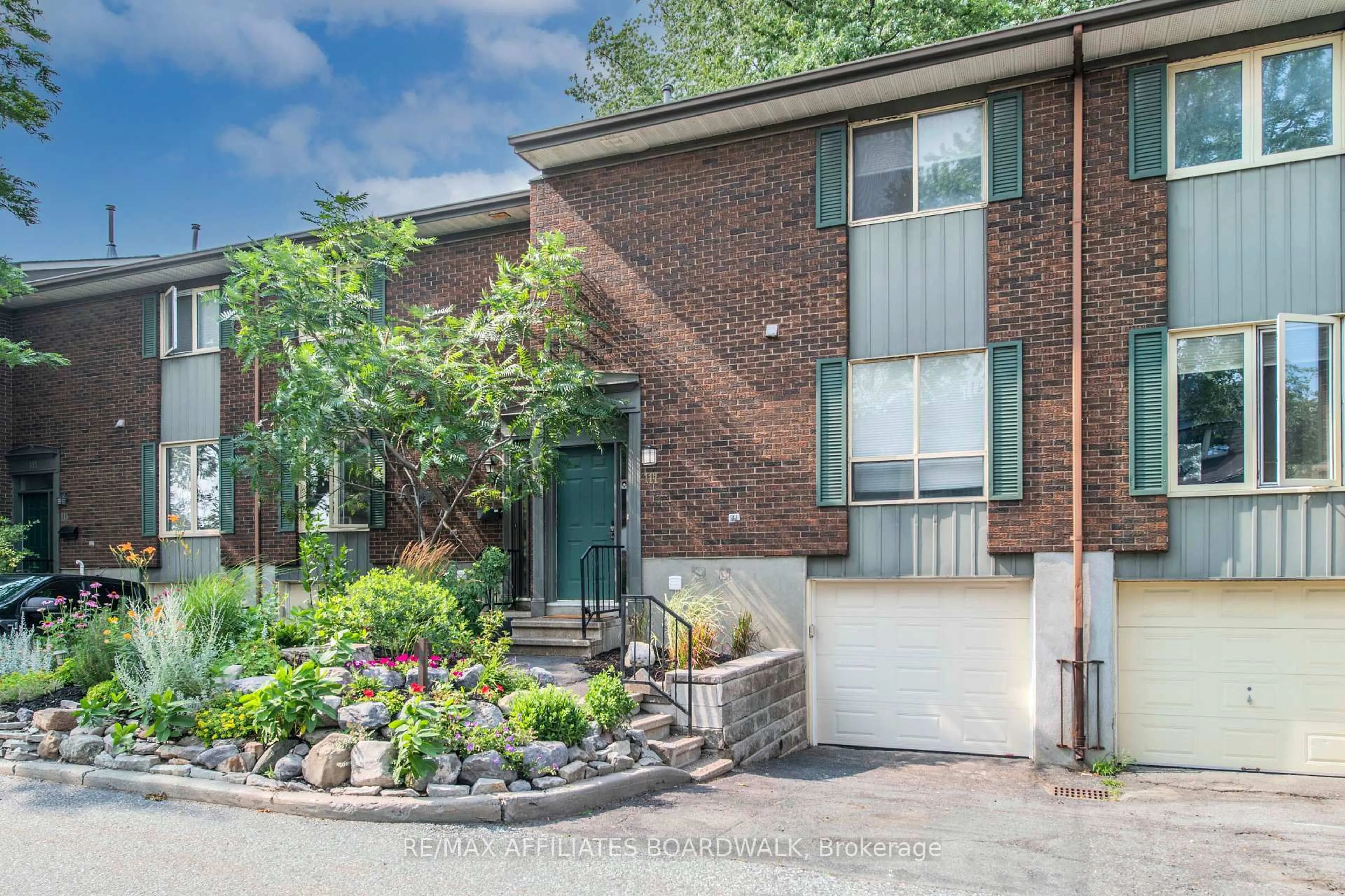 Home with brick exterior material, street for 111 Beachview Private #68, Ottawa Ontario K1V 1M7